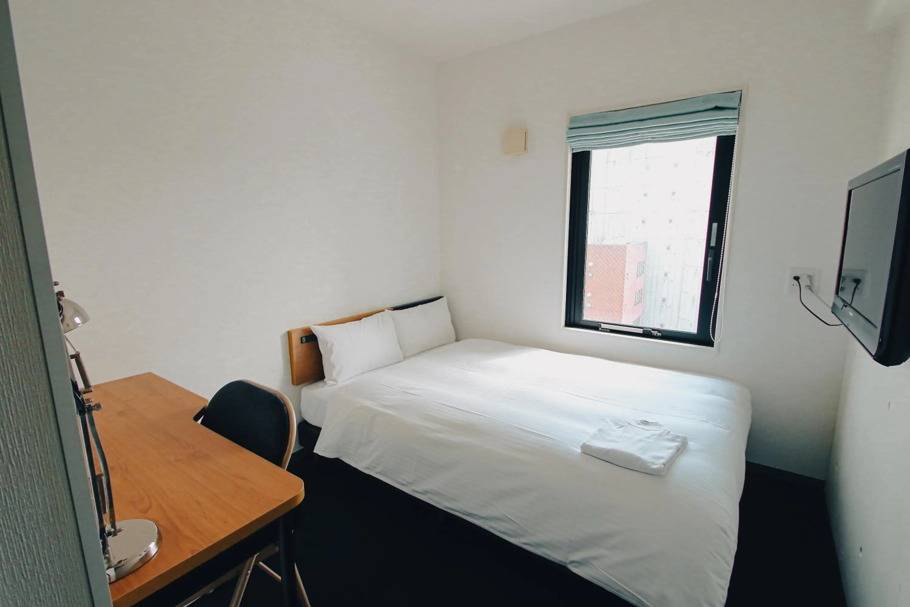 Bed in 8 Hotel Shonan Fujisawa