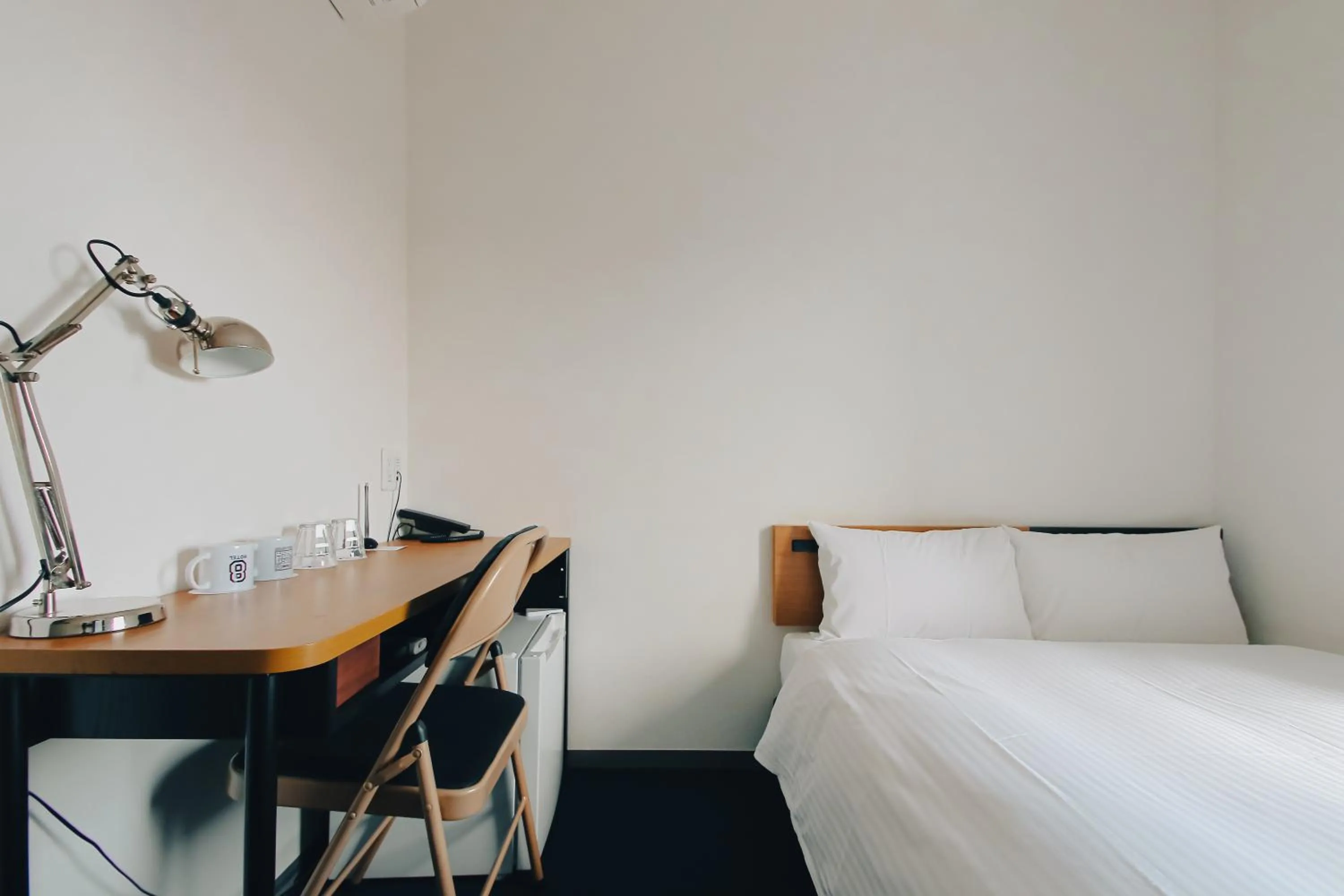 Bed in 8 Hotel Shonan Fujisawa