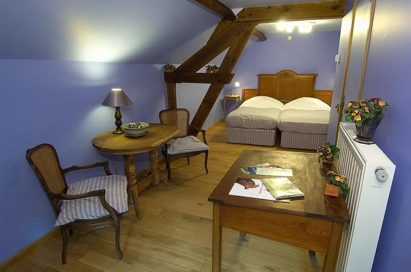 Seating area, Bed in Het Pachthof