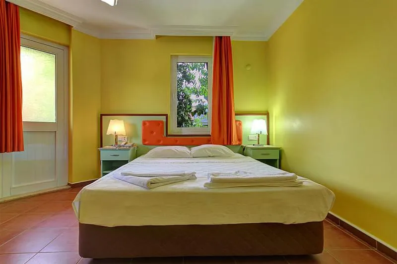 Bedroom in Mandalinn Hotel