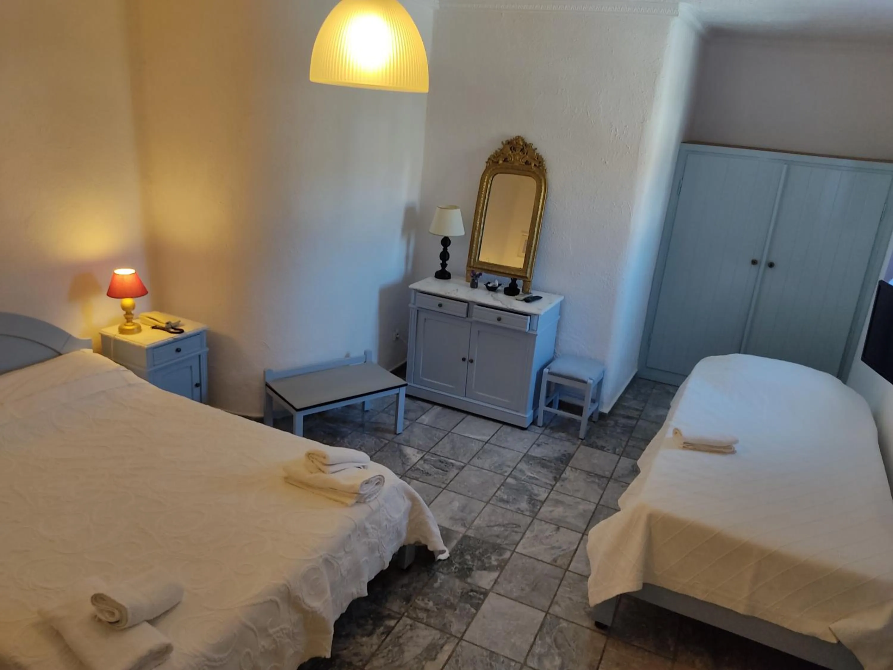 Bed in Porto Sikinos Hotel