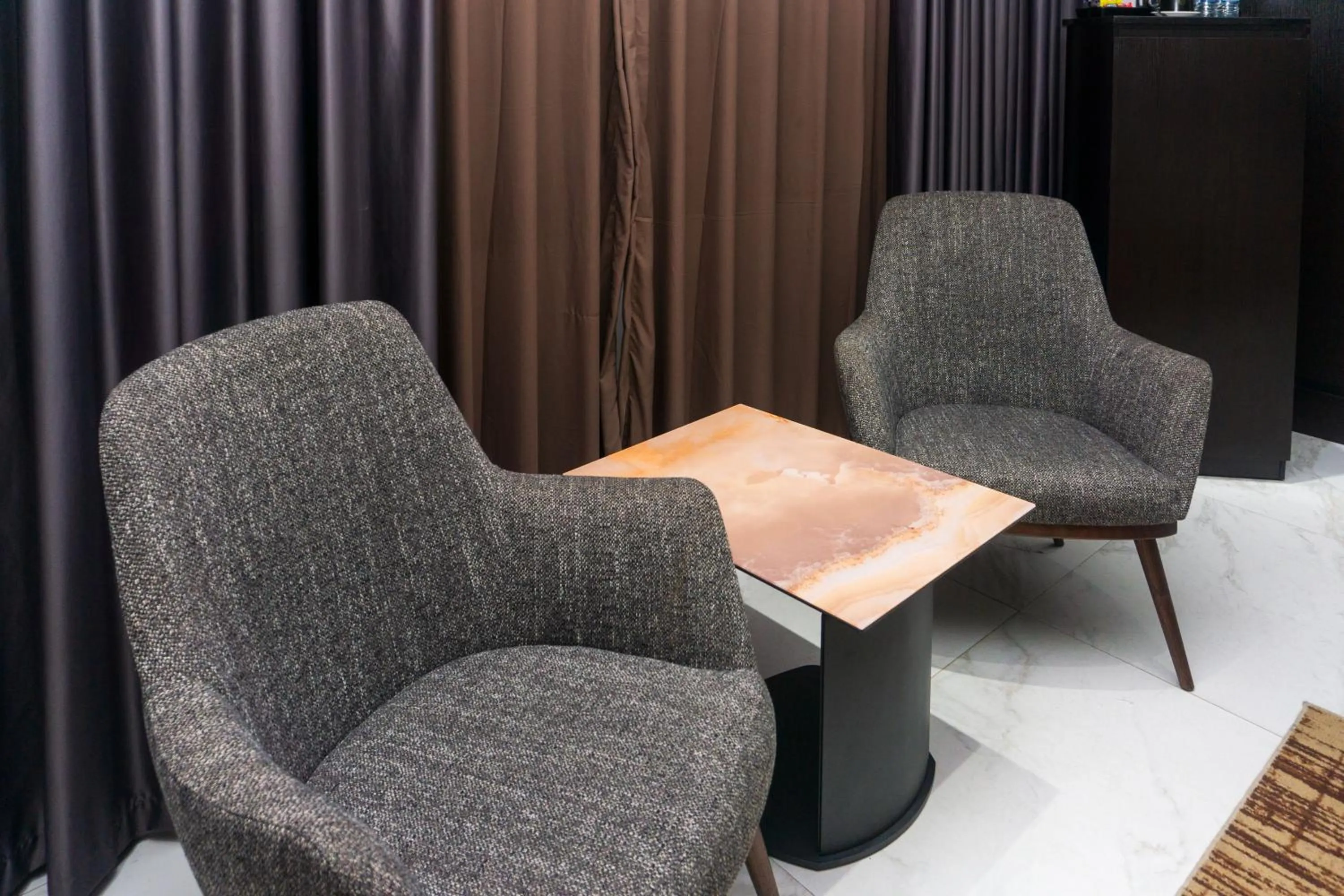 Seating area in GreenPoint Hotel