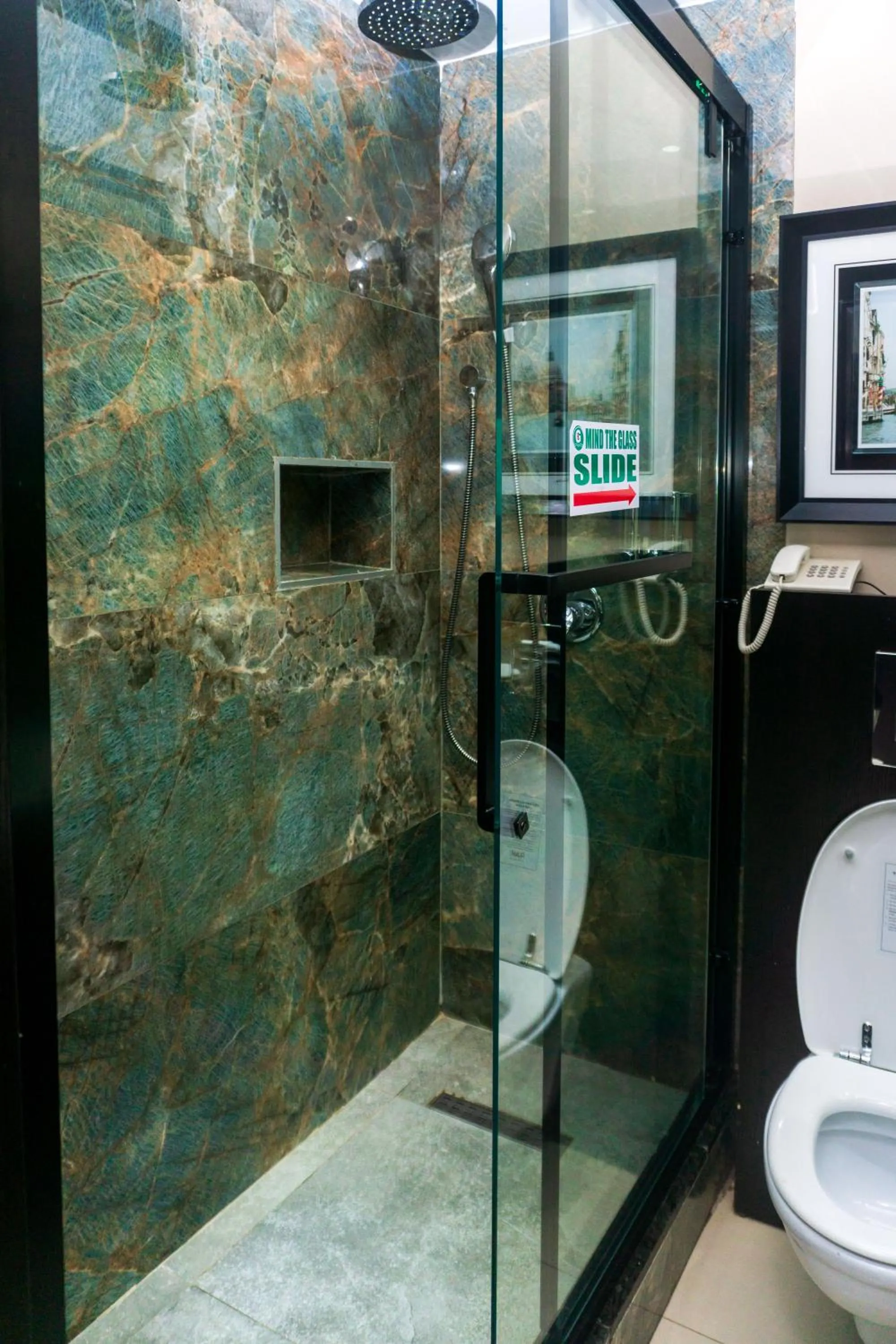 Shower in GreenPoint Hotel