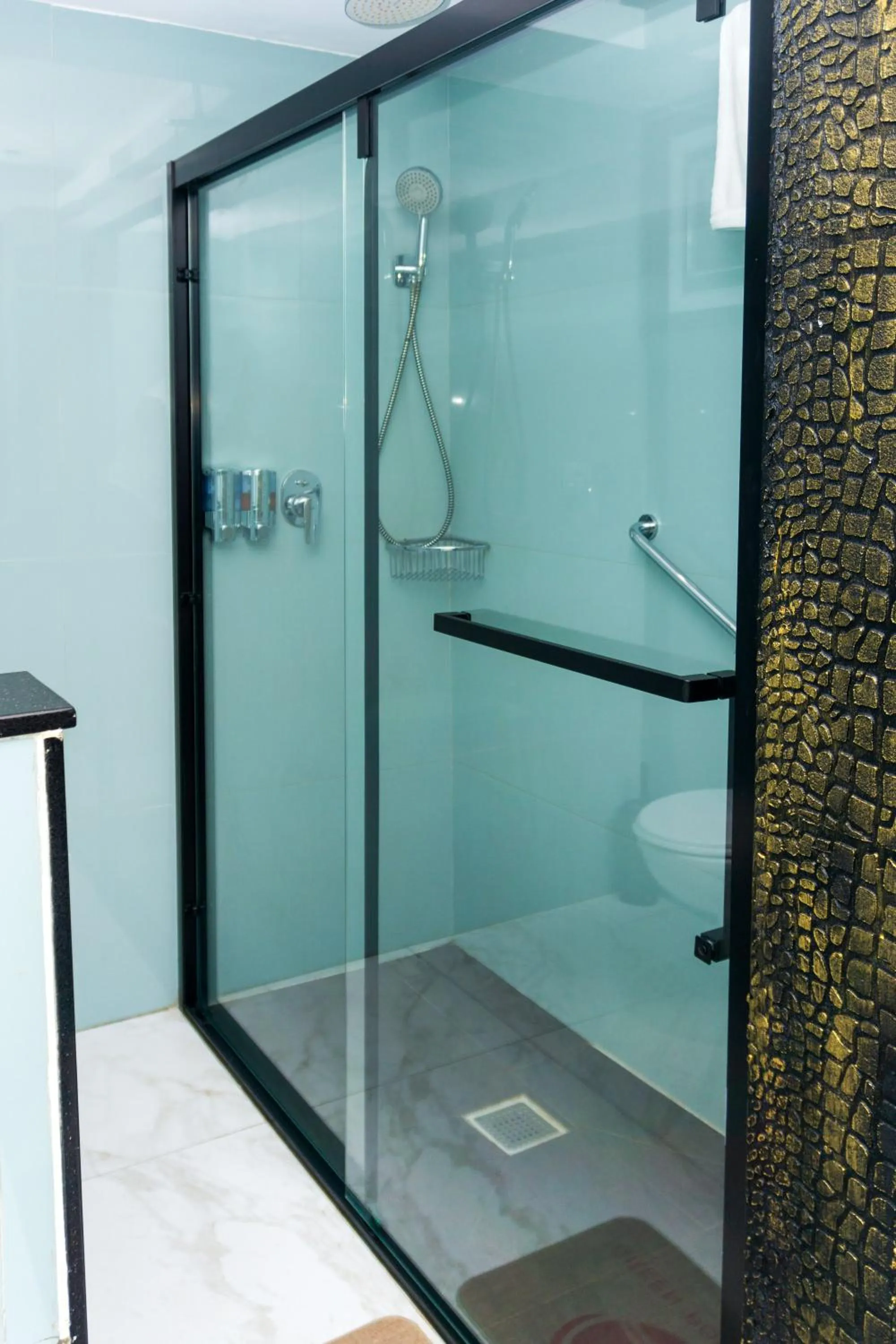 Shower in GreenPoint Hotel