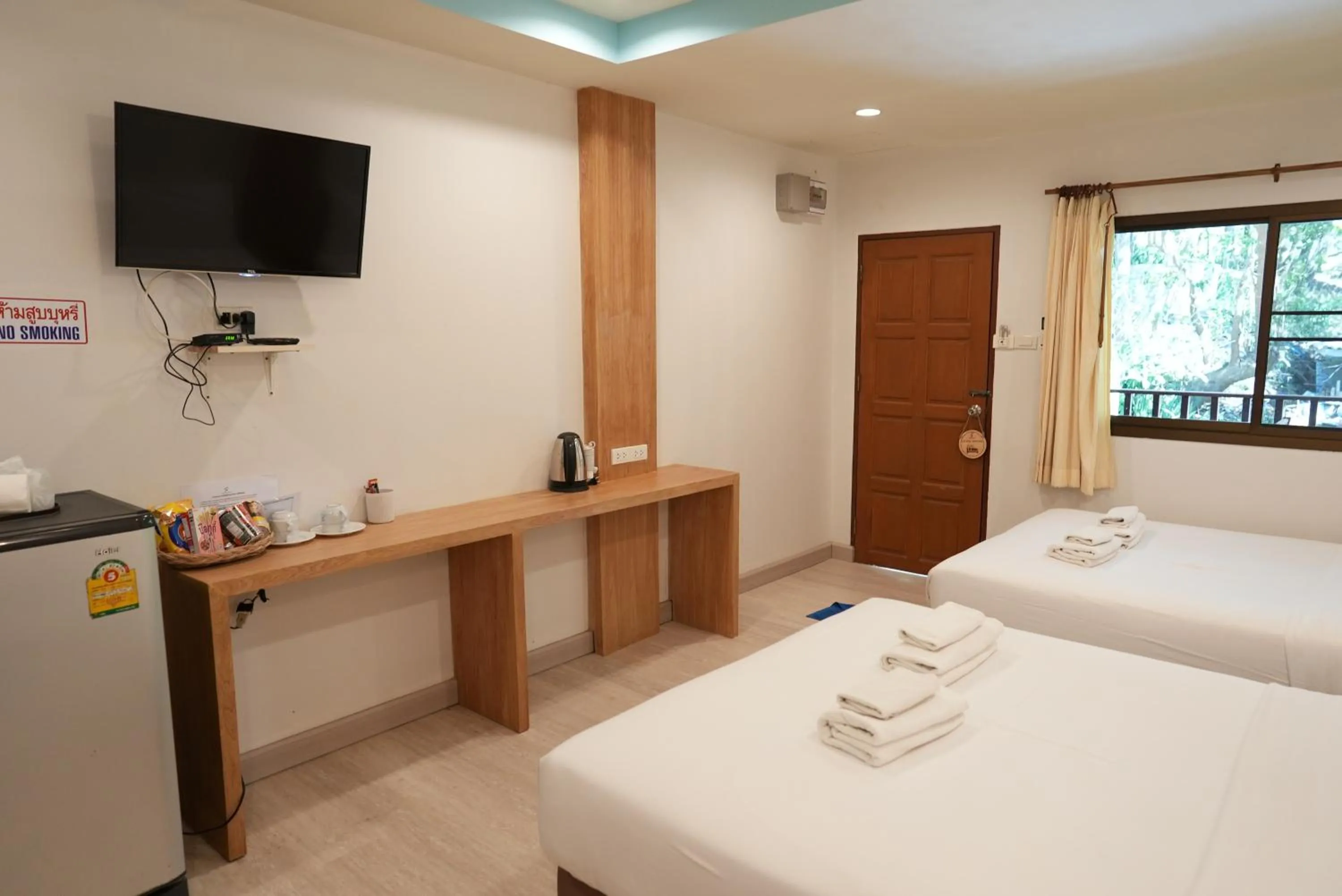 Bed in Sangthian Beach Resort