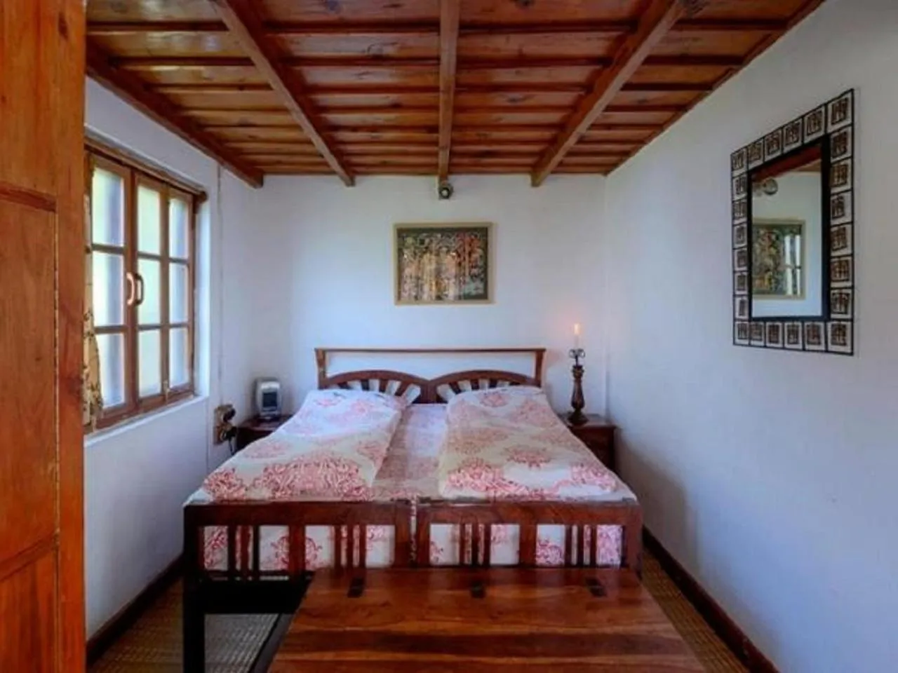 Bed in Jungle Lore Birding Lodge