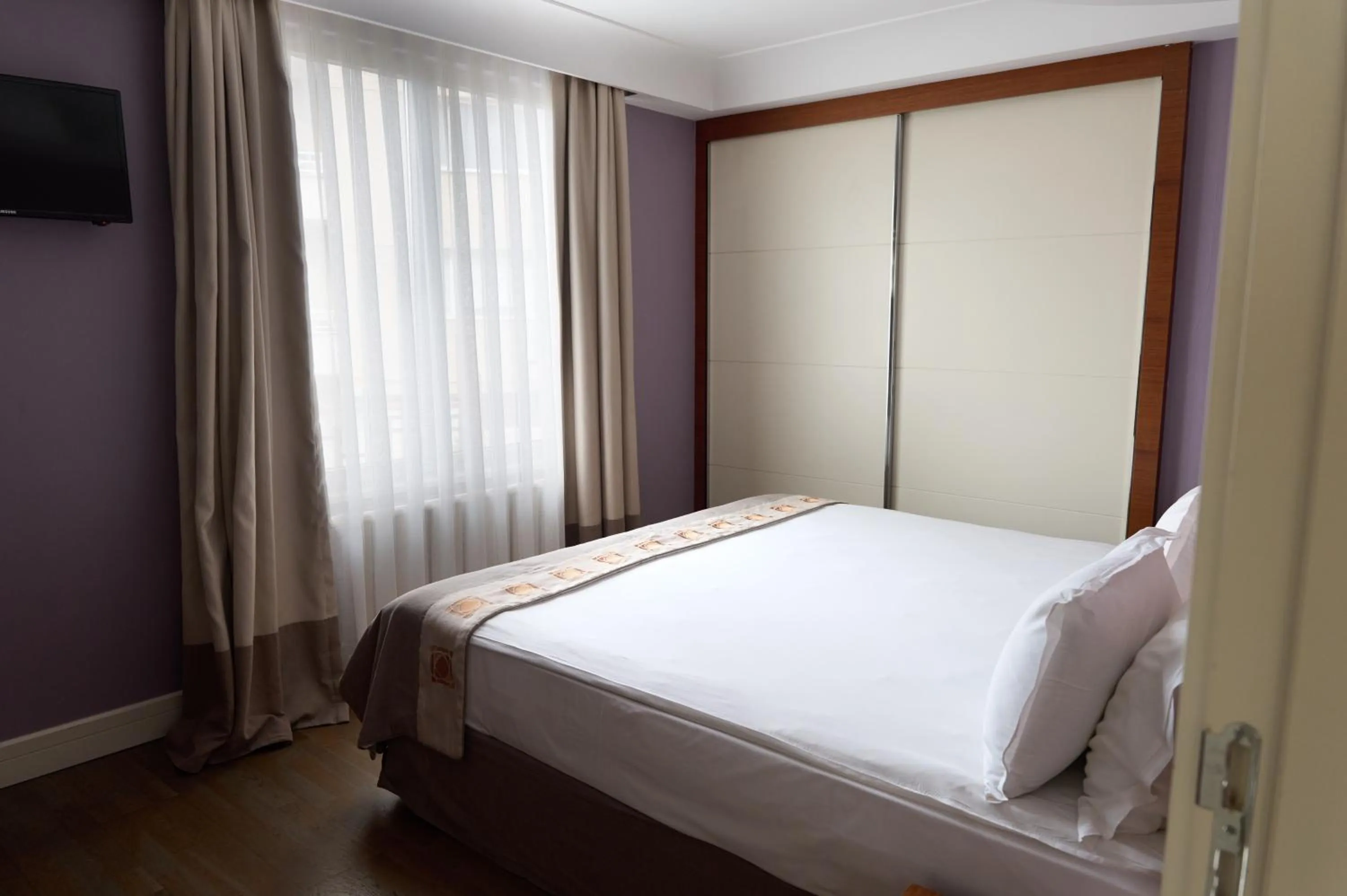 Bed in Taba Luxury Suites and Hotel