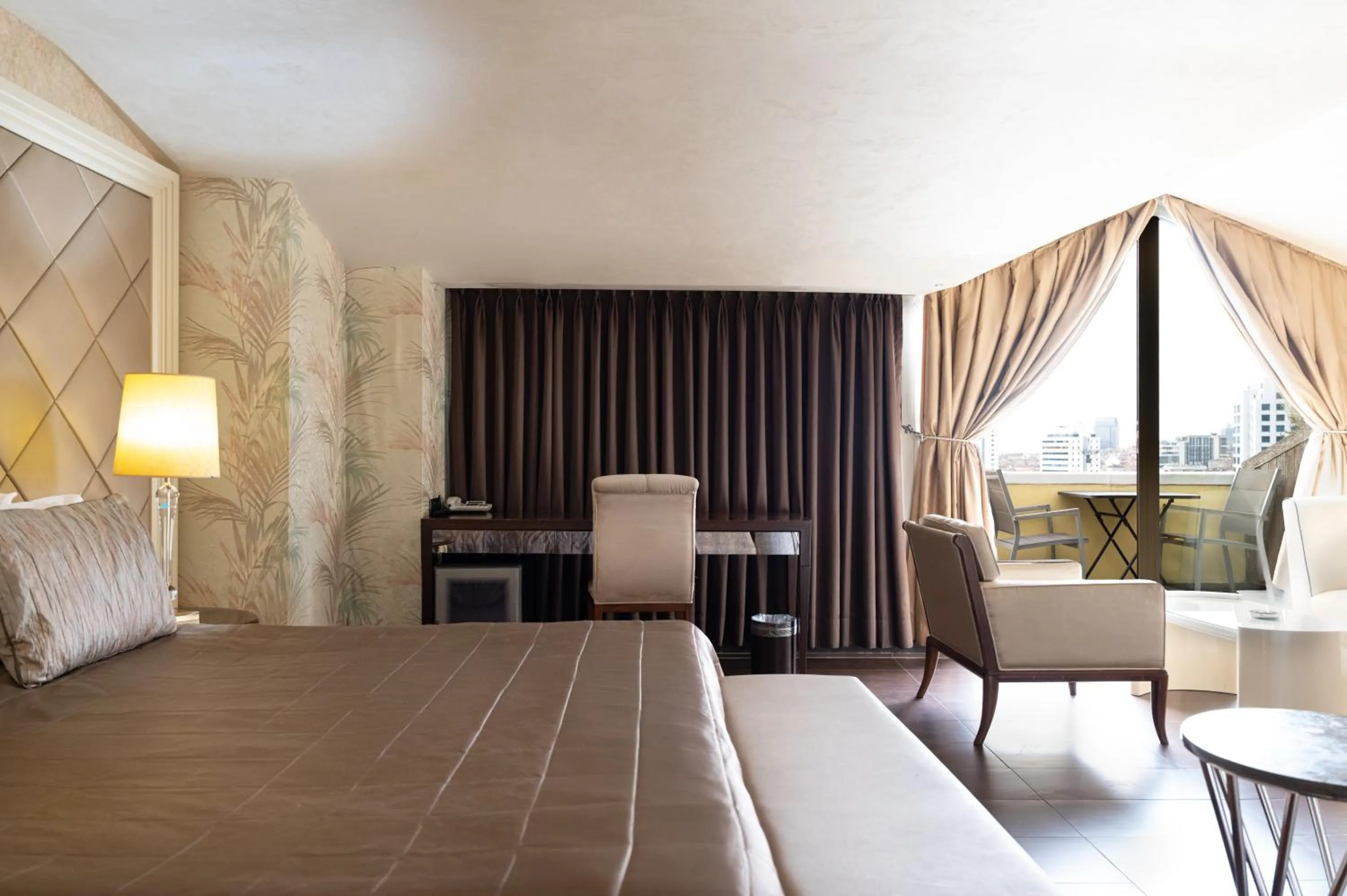 Bed in Taba Luxury Suites and Hotel