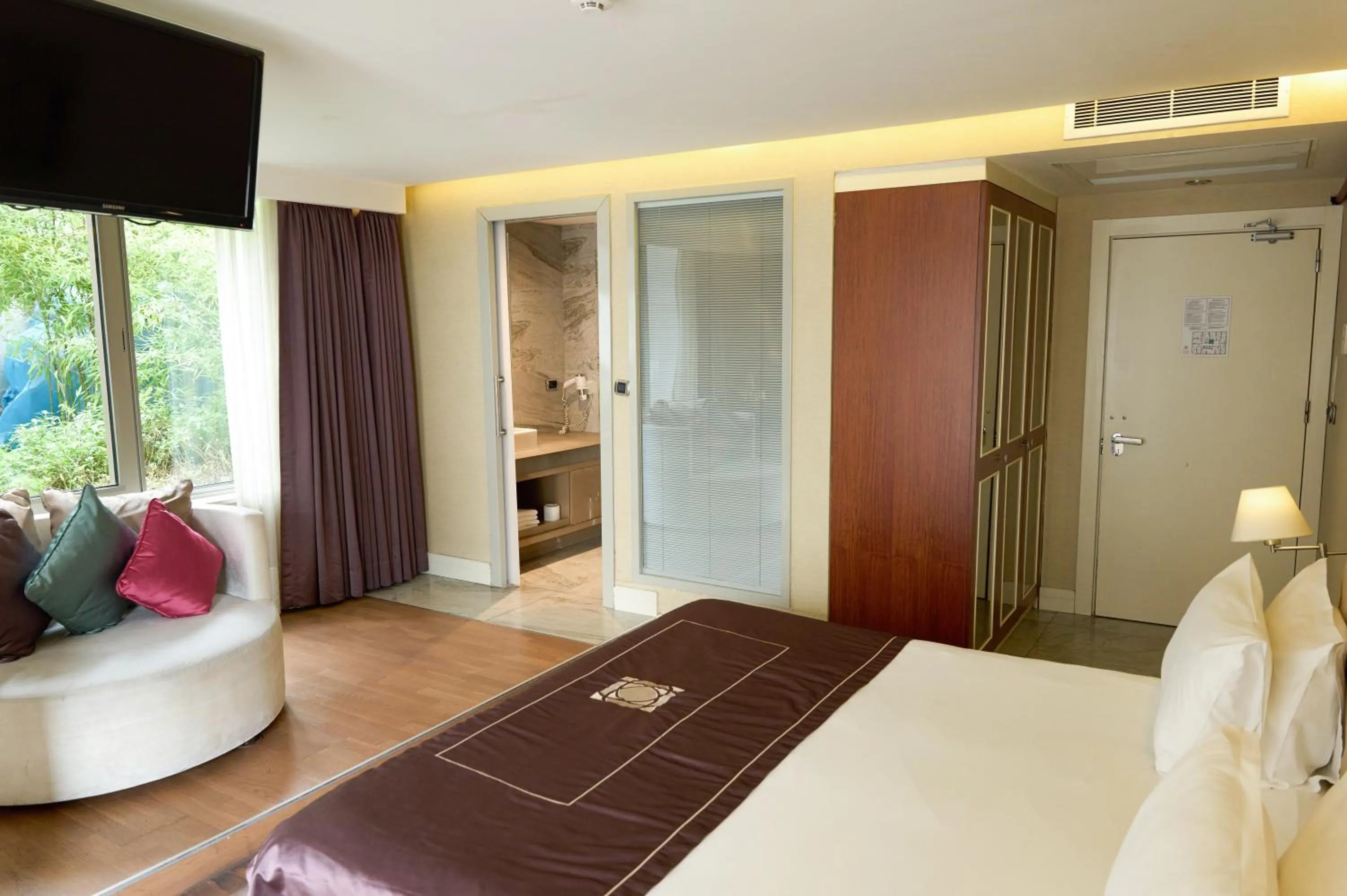 Bed in Taba Luxury Suites and Hotel