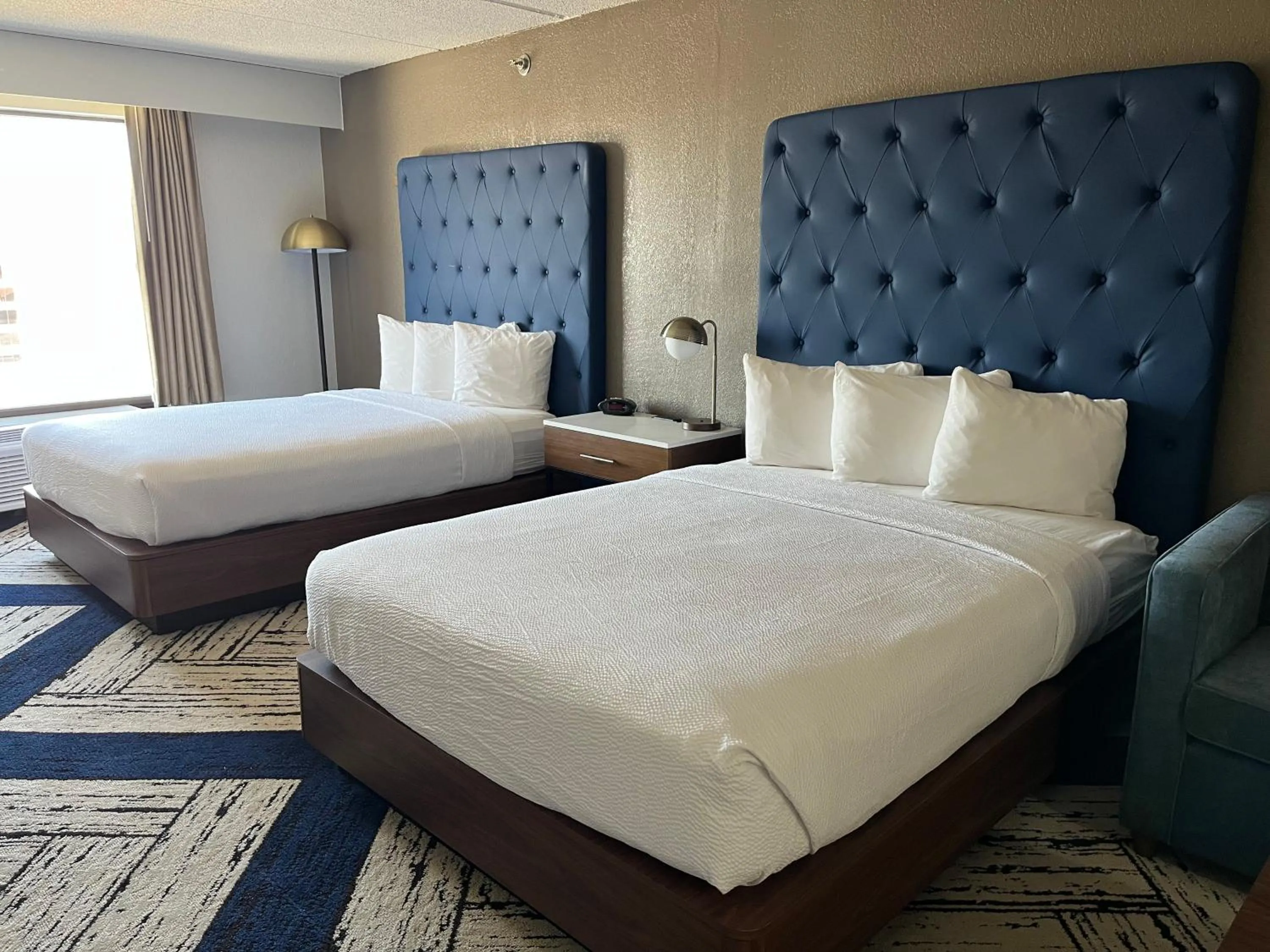 Photo of the whole room, Bed in Sky Point Hotel & Suites - Atlanta Airport