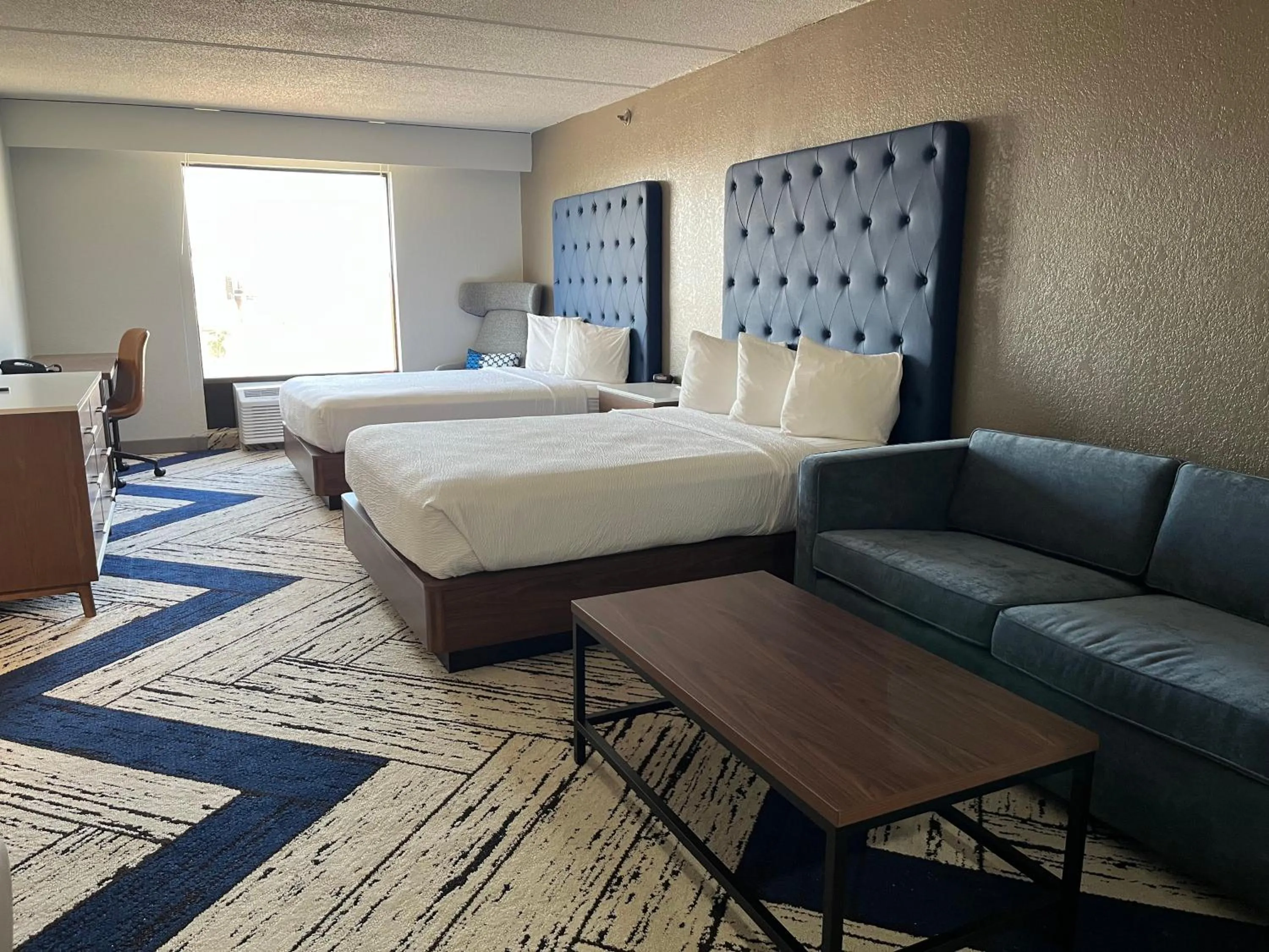 Photo of the whole room, Bed in Sky Point Hotel & Suites - Atlanta Airport