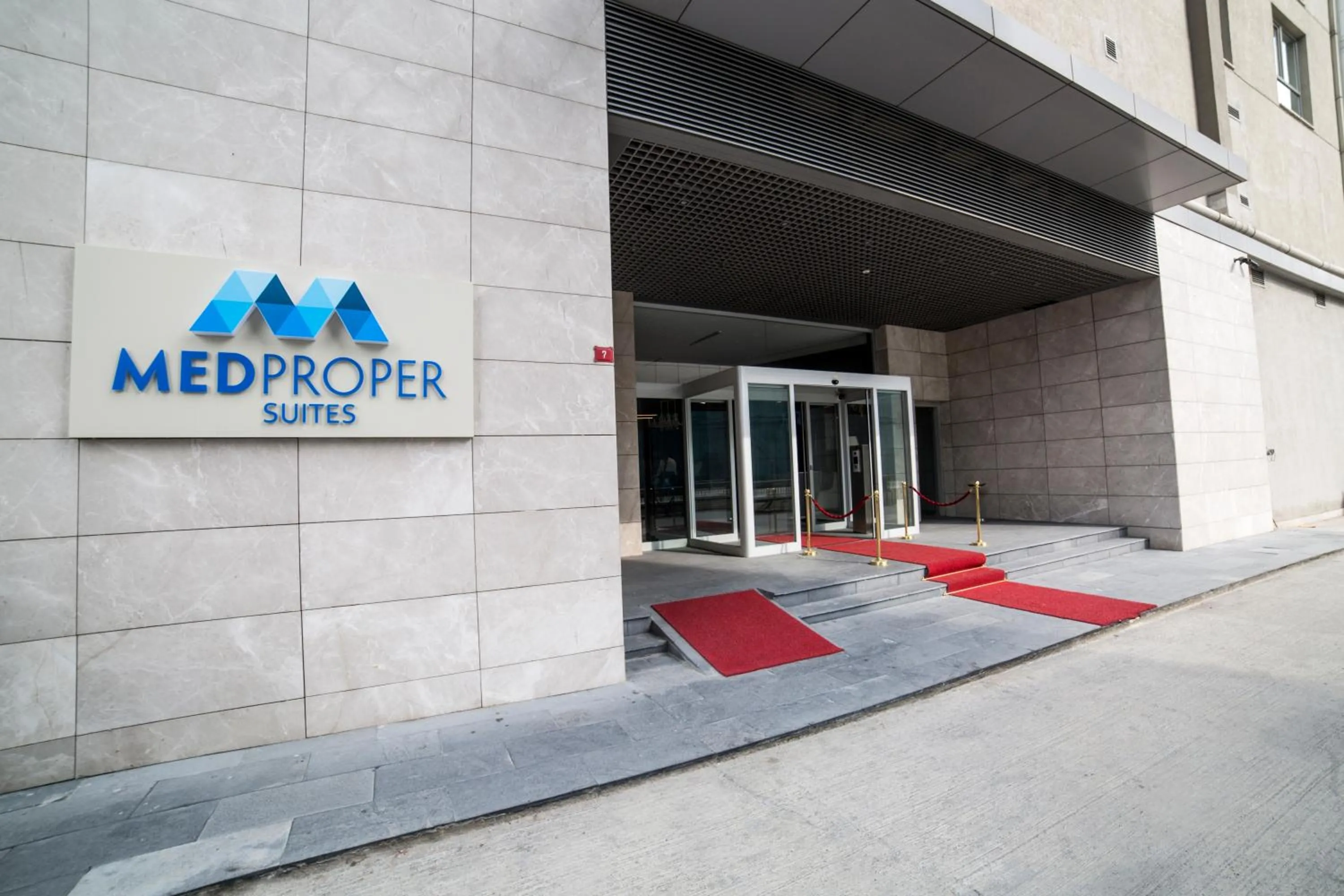 Property logo or sign in Medproper Suites Airport