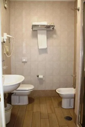 Toilet in DOMUS Grand Hotel
