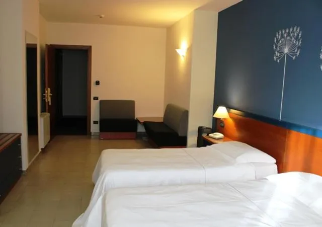 Photo of the whole room, Bed in DOMUS Grand Hotel