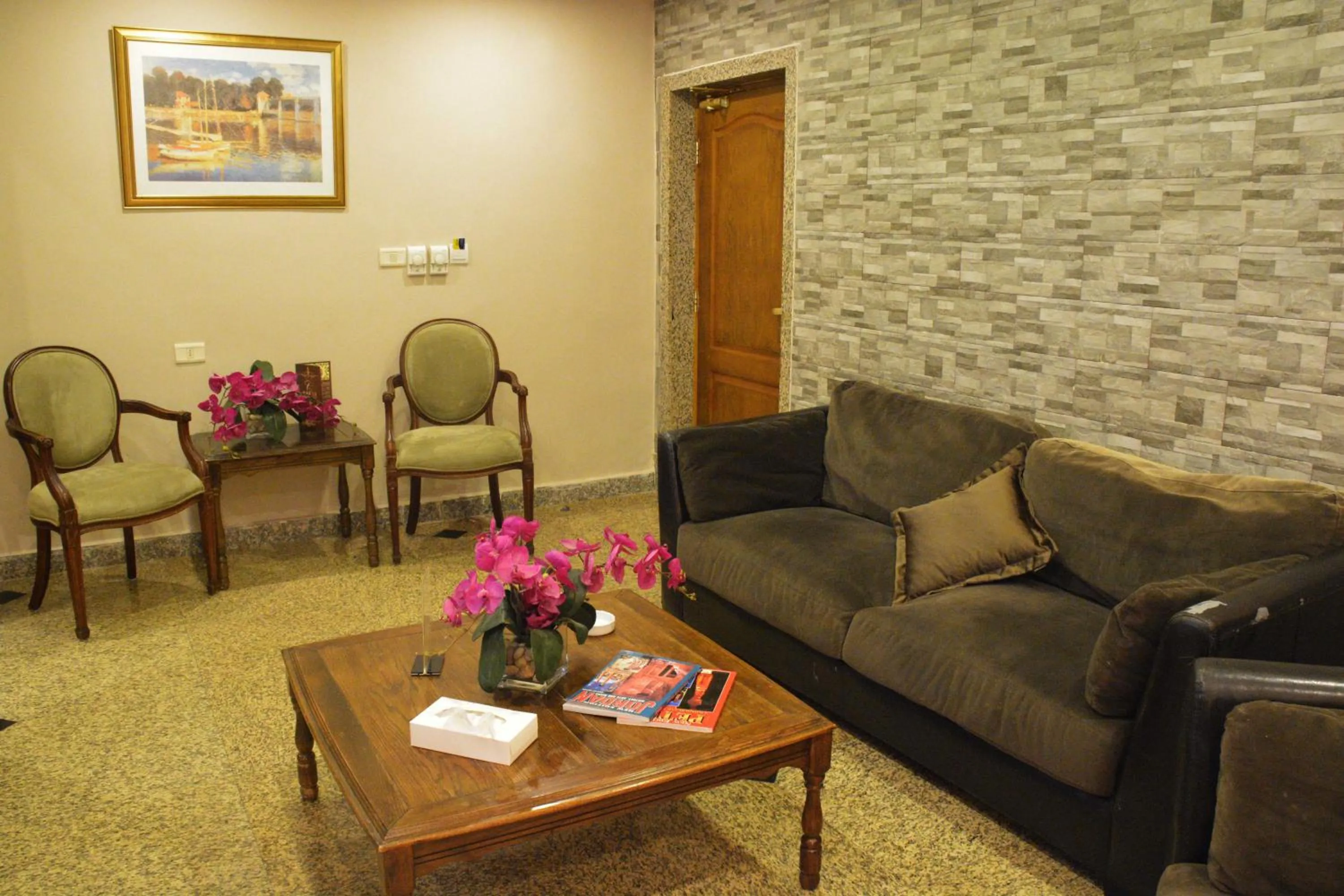 Living room in Capri Hotel Suites