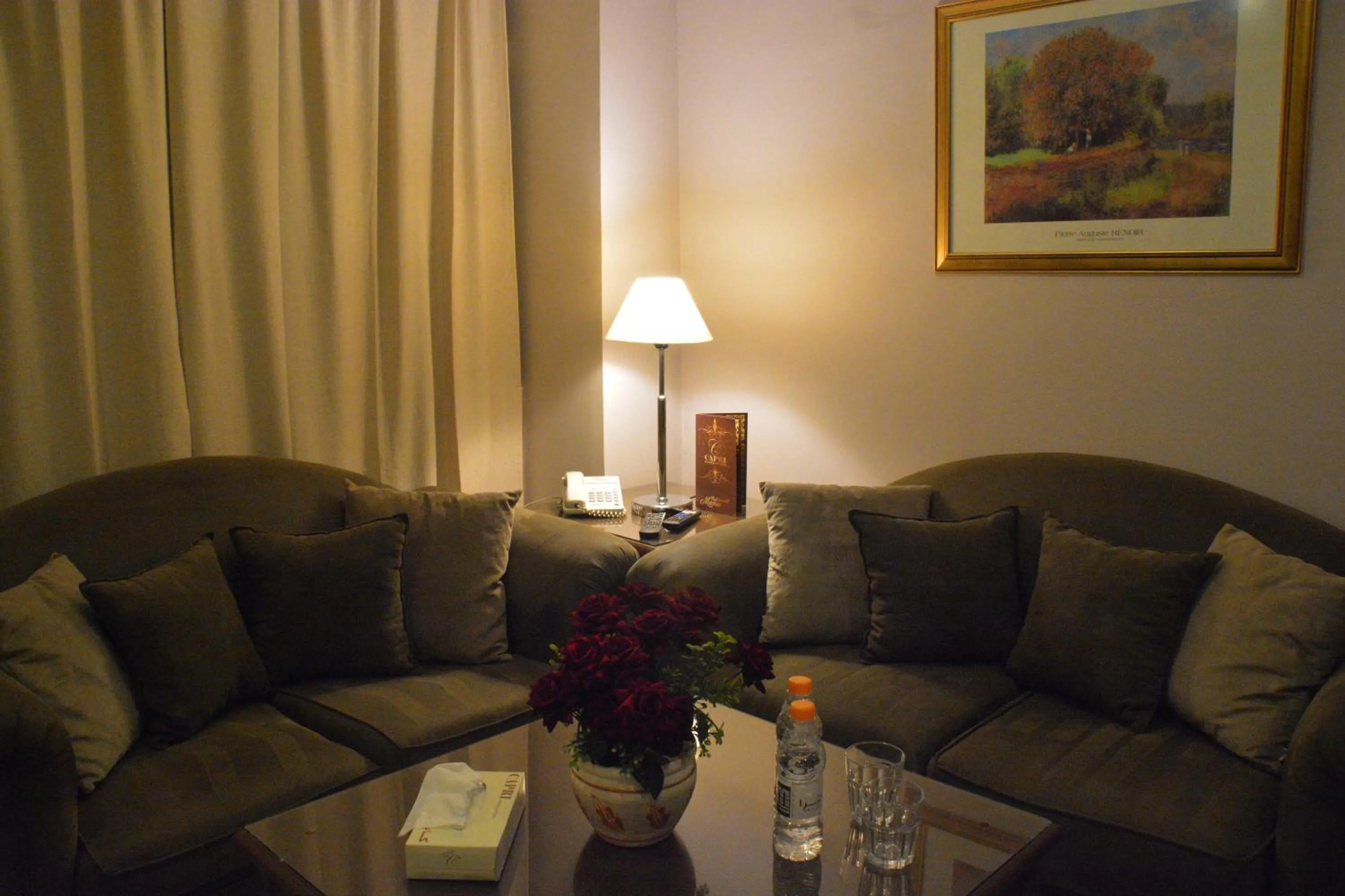 Living room in Capri Hotel Suites