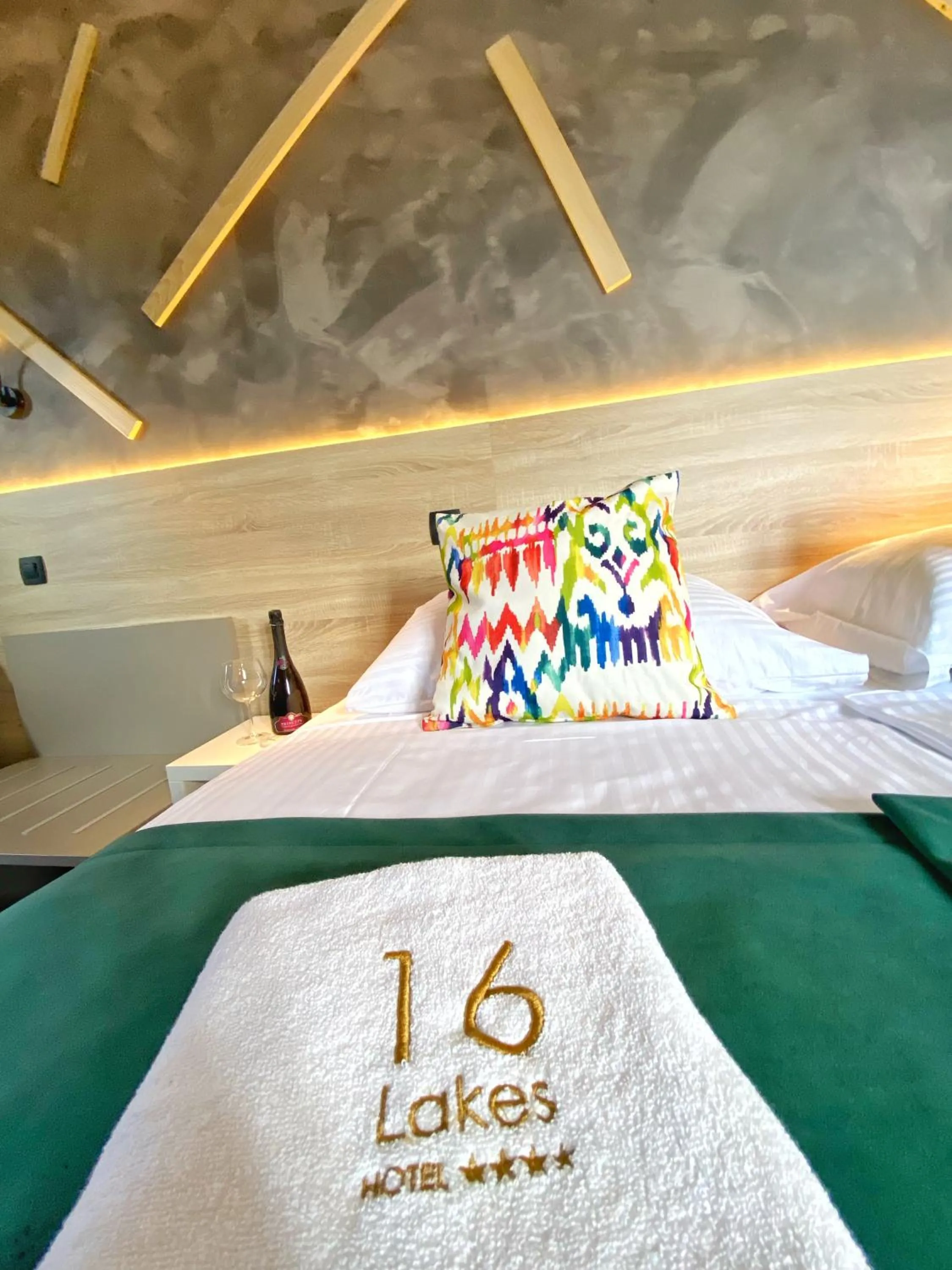 Bed in 16 Lakes Hotel