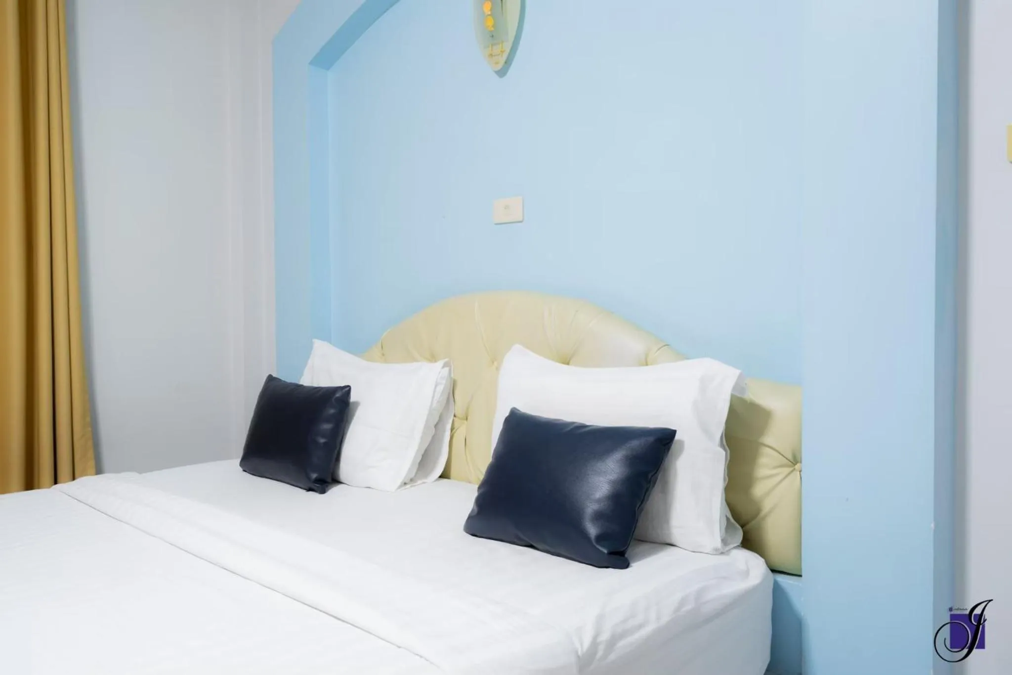 Bed in Jintana Resort