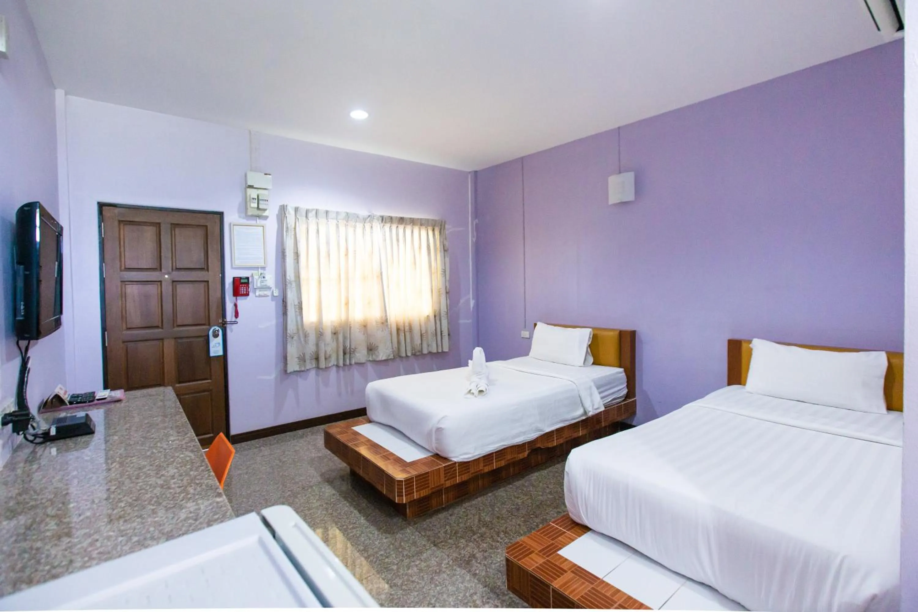 Photo of the whole room, Bed in Jintana Resort