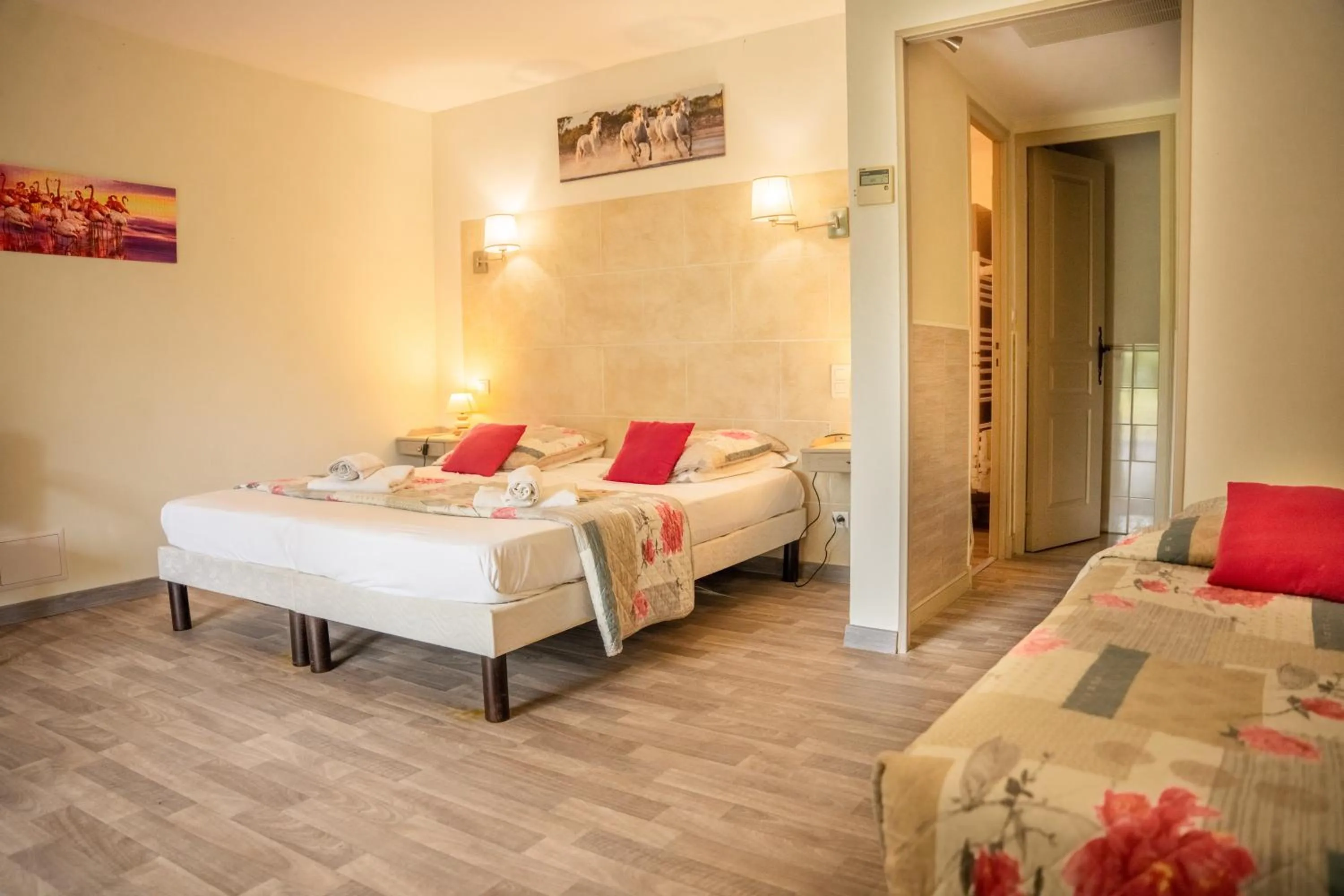 Bed in Logis Hotel des Granges