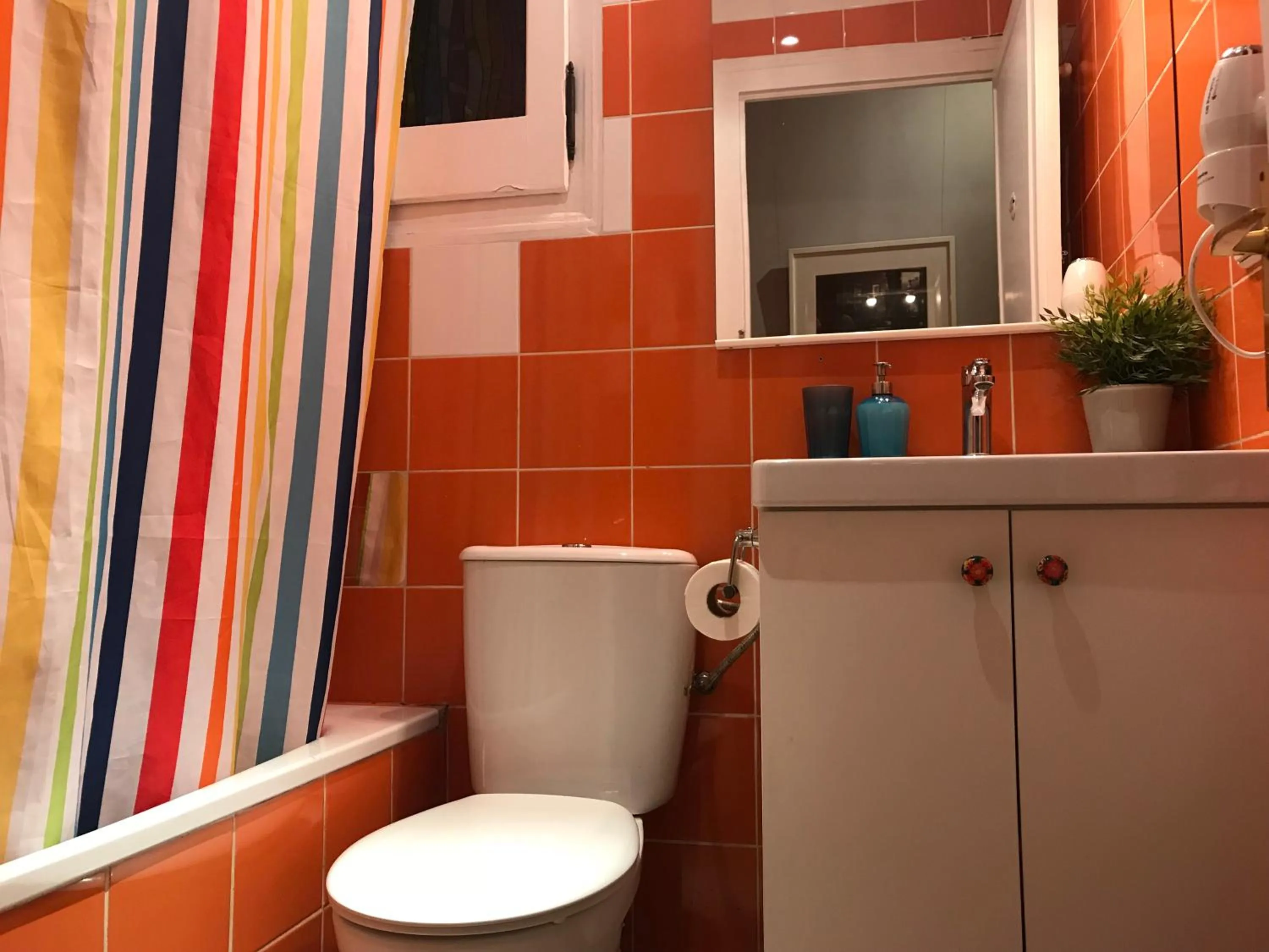 Bathroom in Casa Consell Apartments