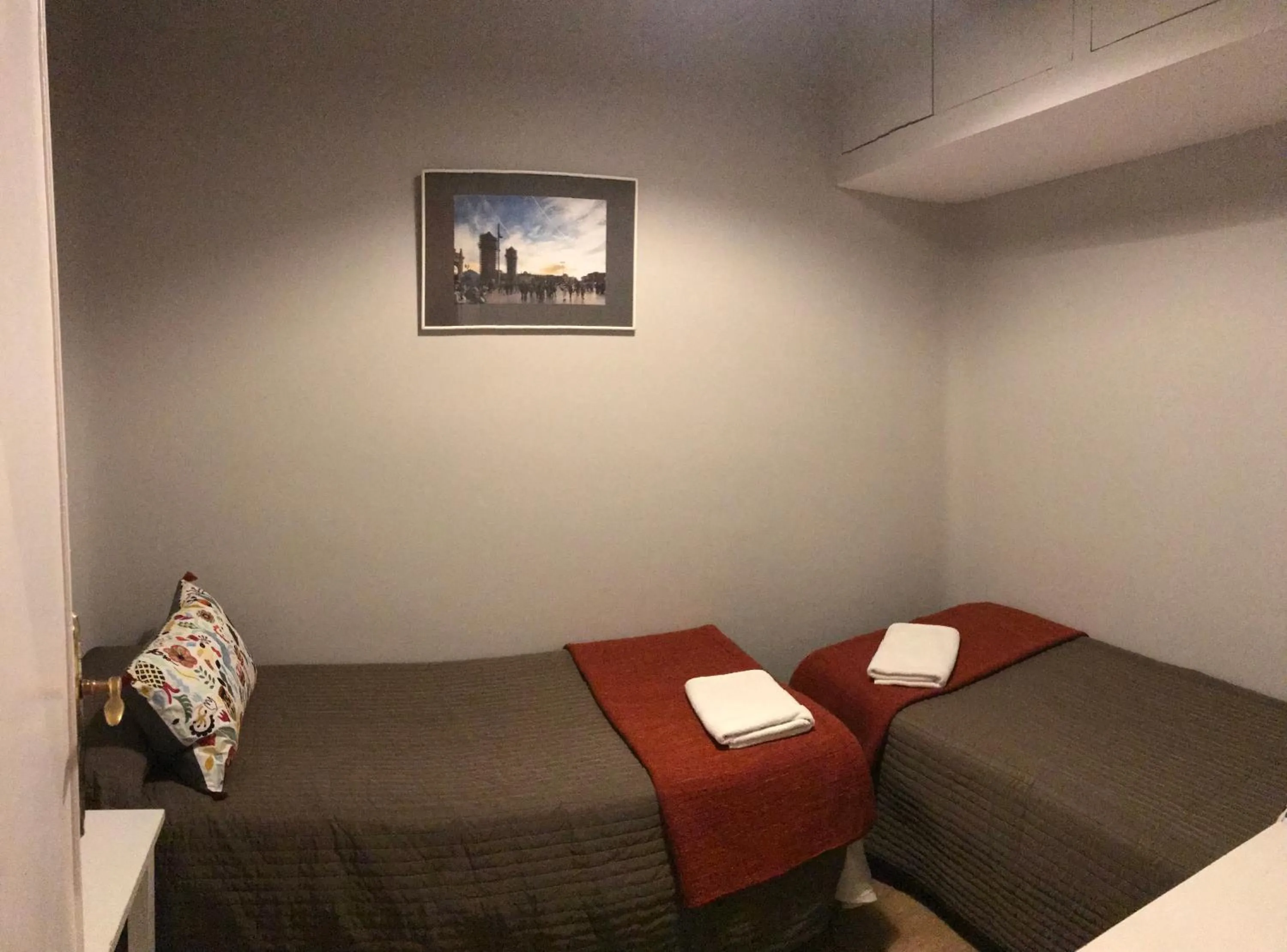 Bed in Casa Consell Apartments