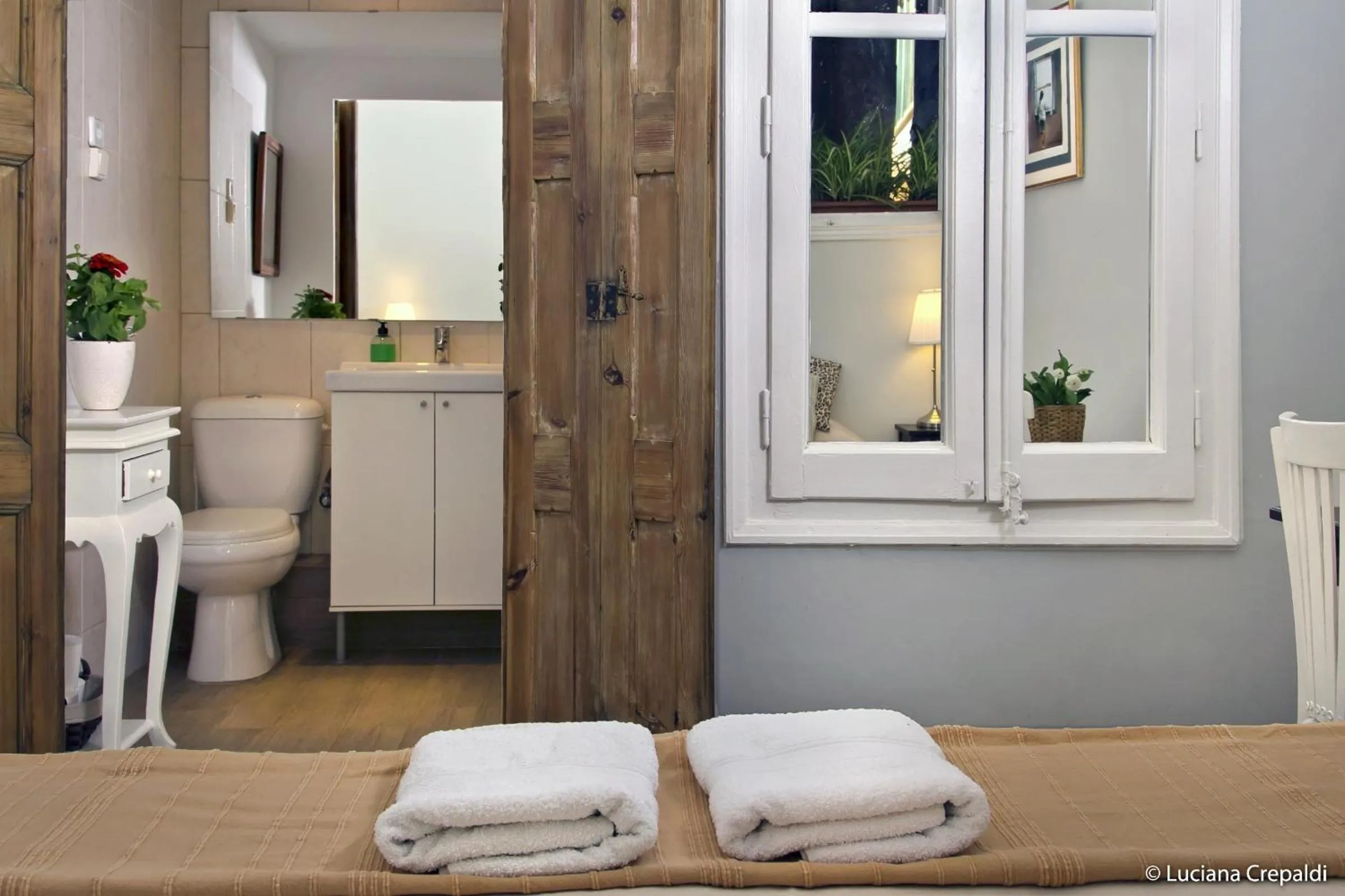 Bathroom in Casa Consell Apartments
