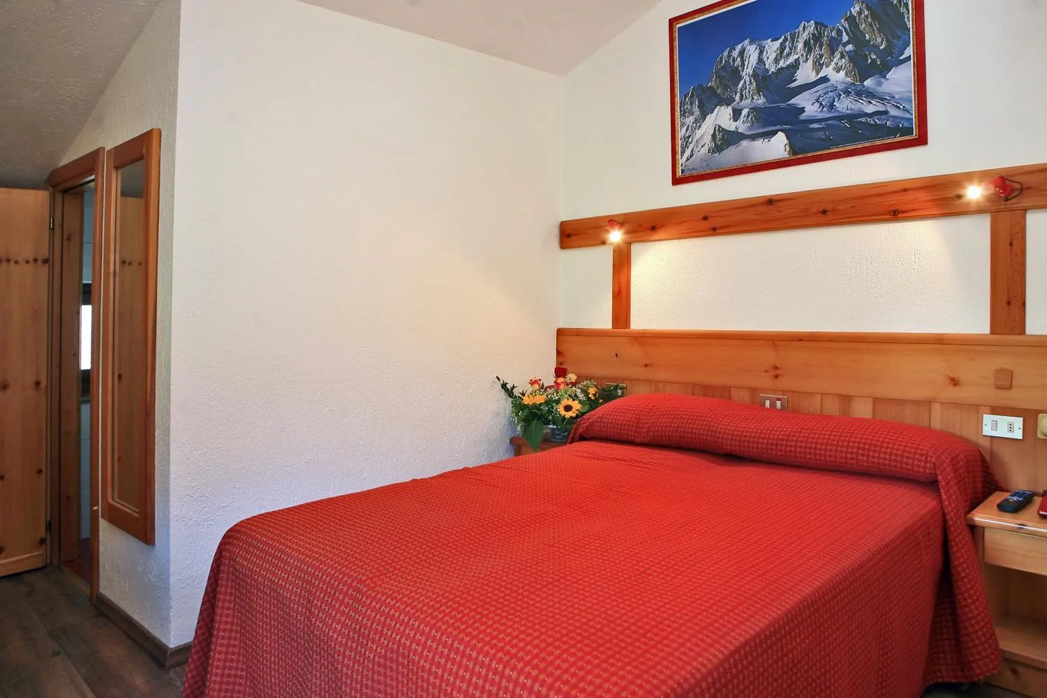 Bed in Albergo Le Marmotte