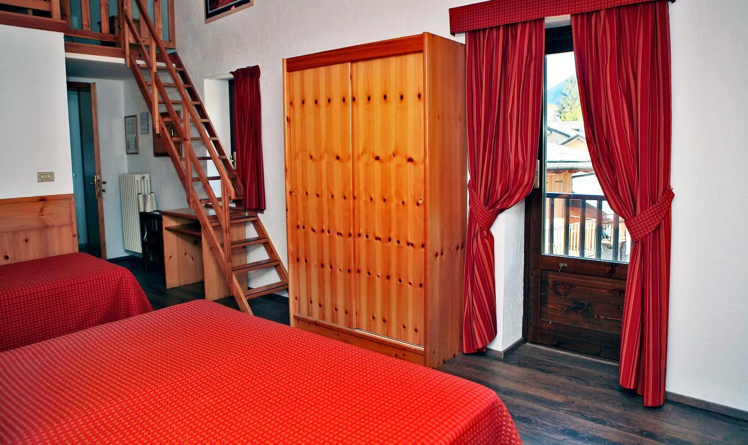 Bed in Albergo Le Marmotte