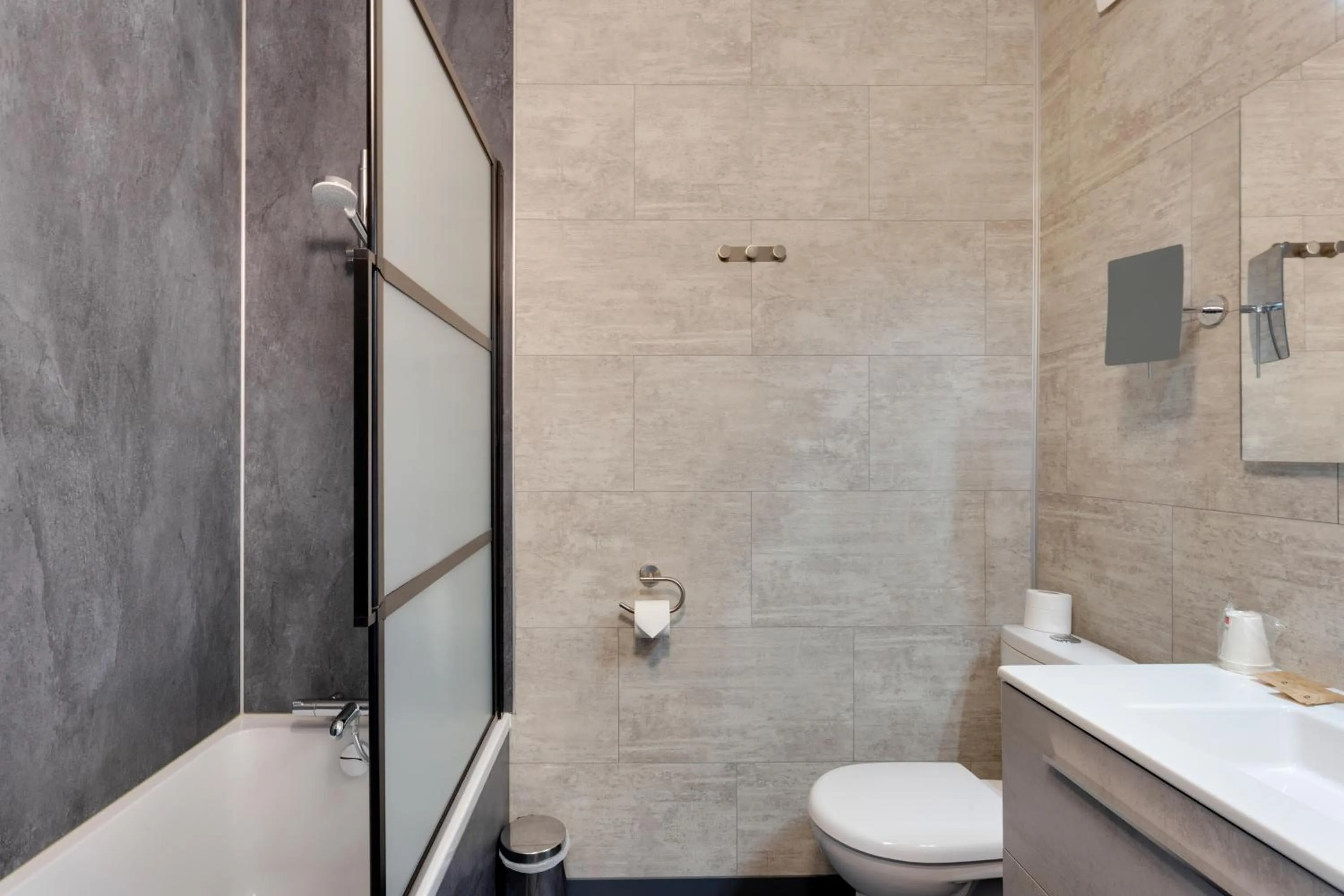 Bathroom in Brit Hotel le Cygne