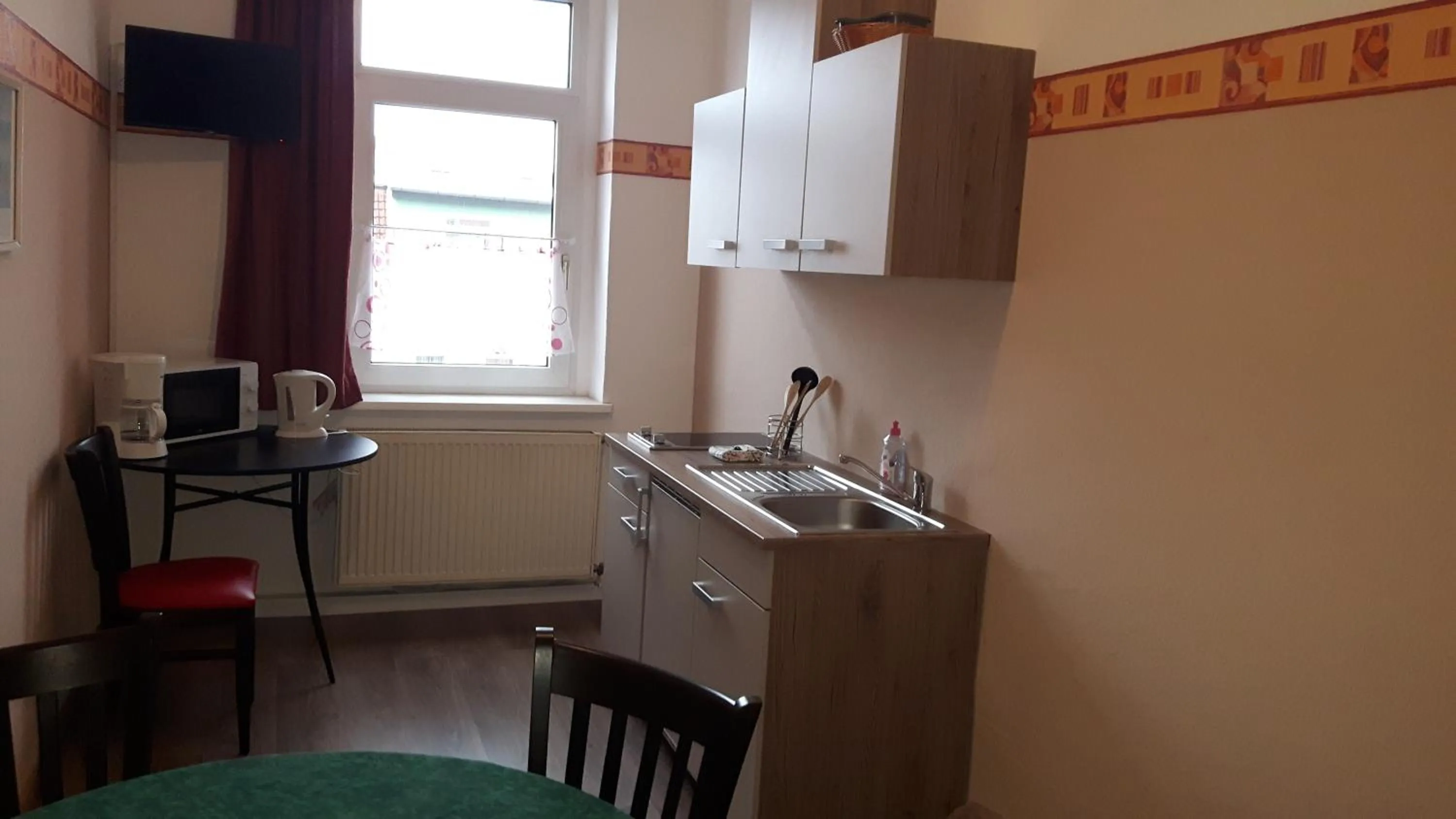 Kitchen or kitchenette in Hotel & Pension Plagwitzer Hof