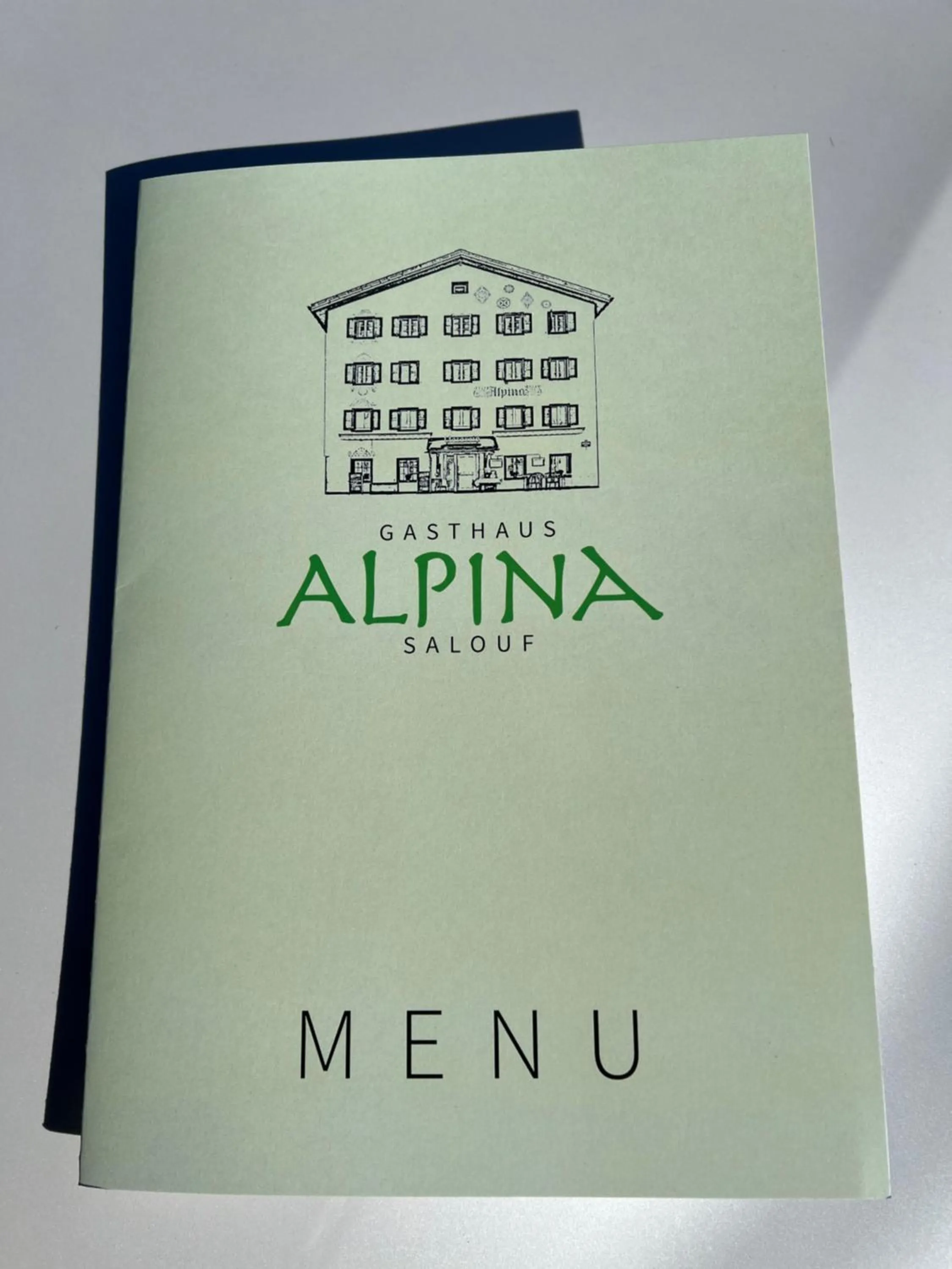 Property logo or sign in Hotel und Restaurant Alpina