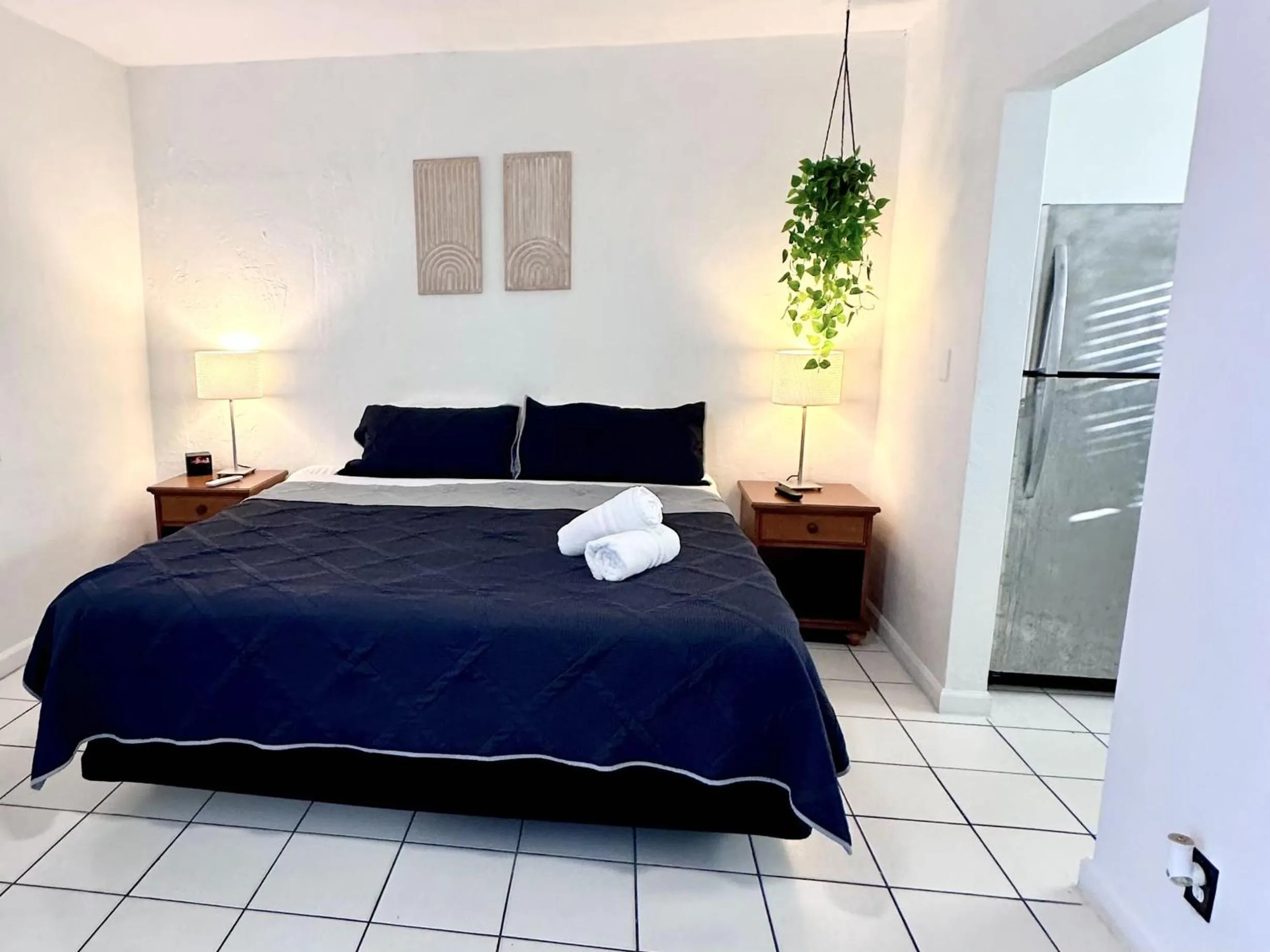 Bed in Southwinds Inn by The Gold Nests