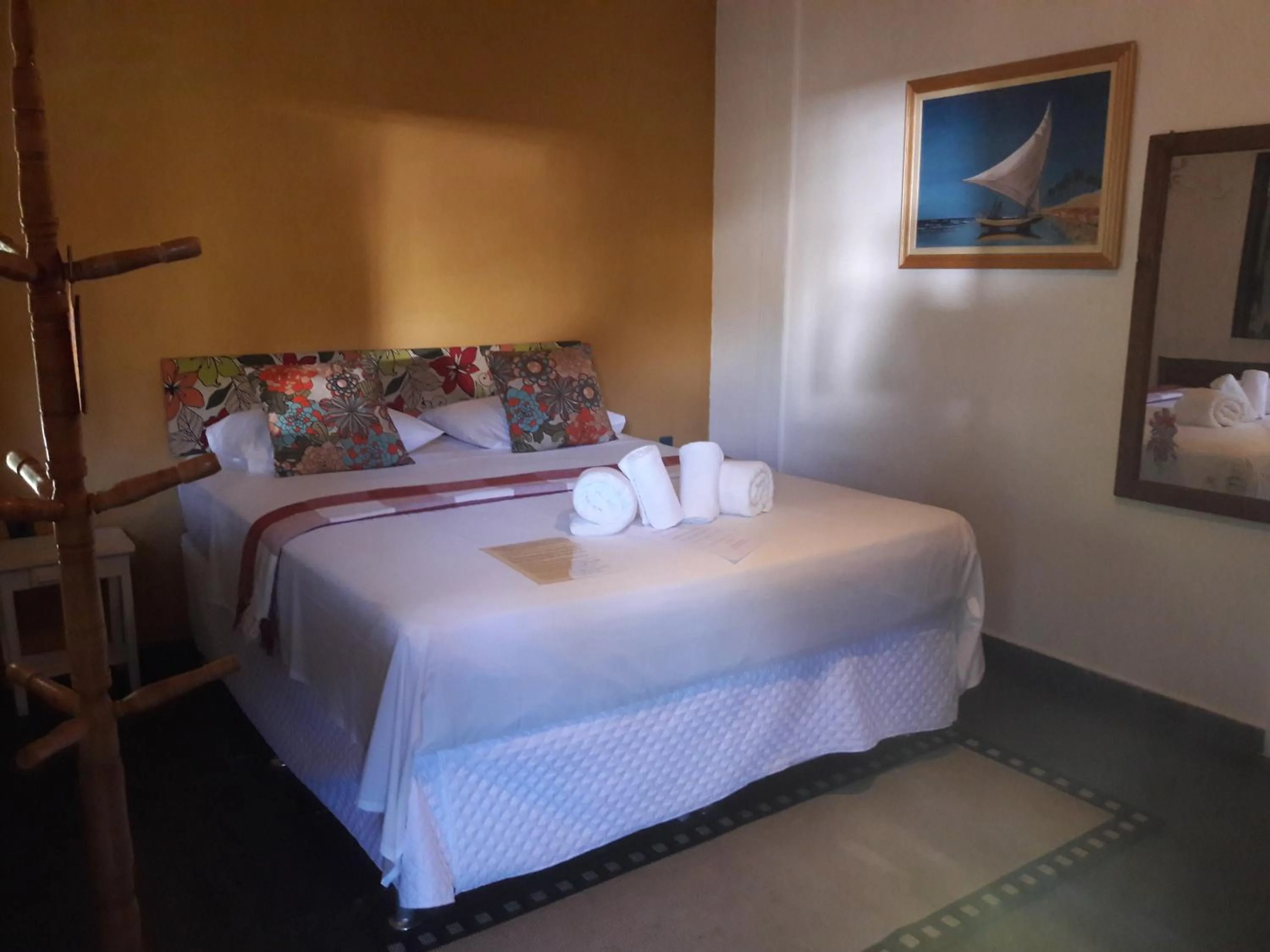 Bed in Pousada Macunaima