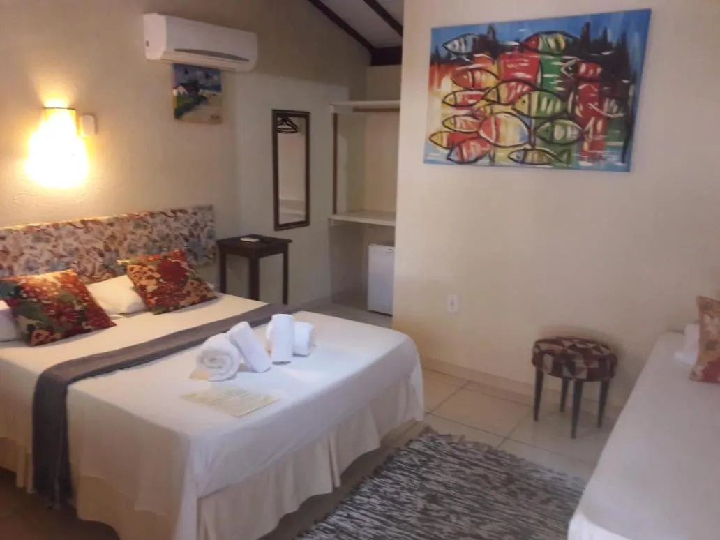 Bed in Pousada Macunaima