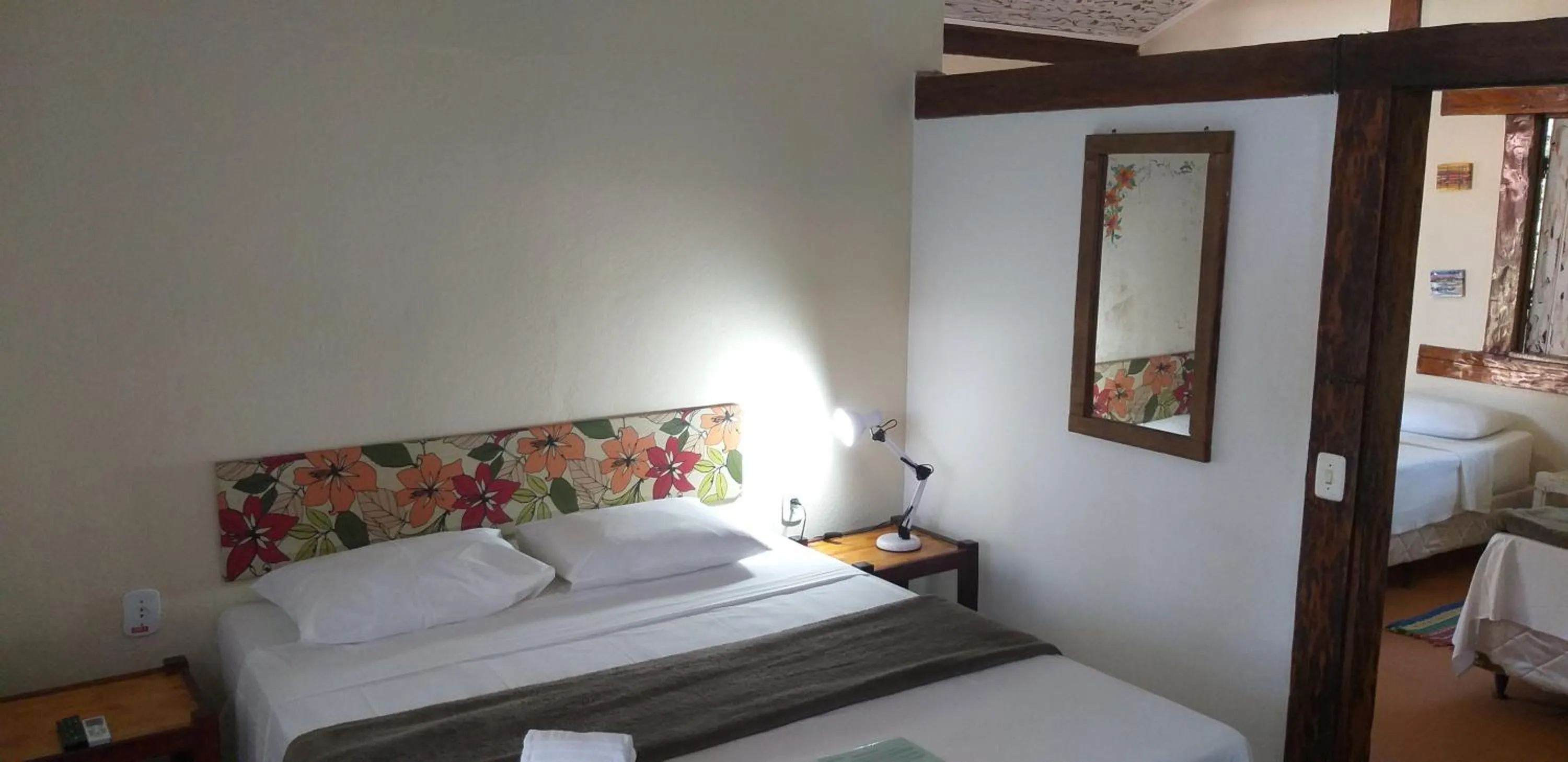 Bed in Pousada Macunaima