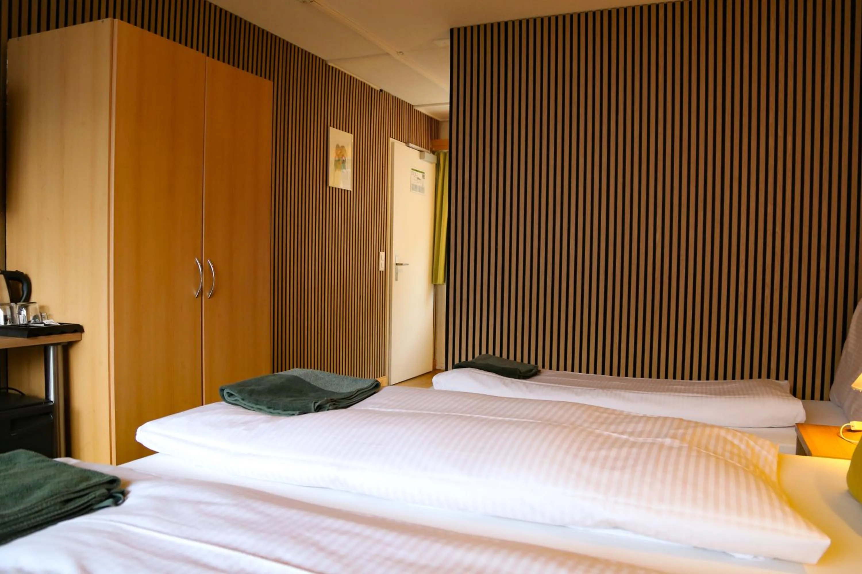 Bed in Hotel Lakeview bei Interlaken