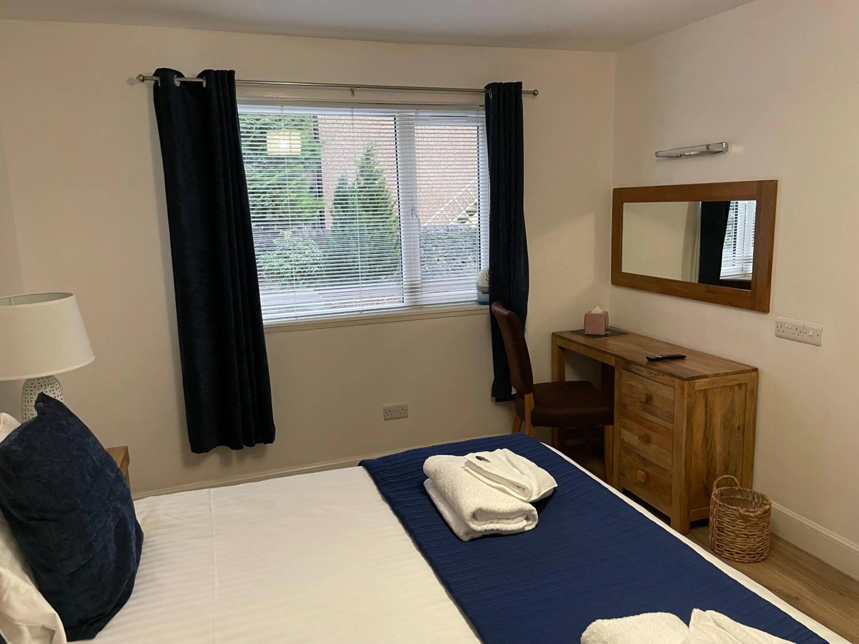 Bed in The Claymore Guest House