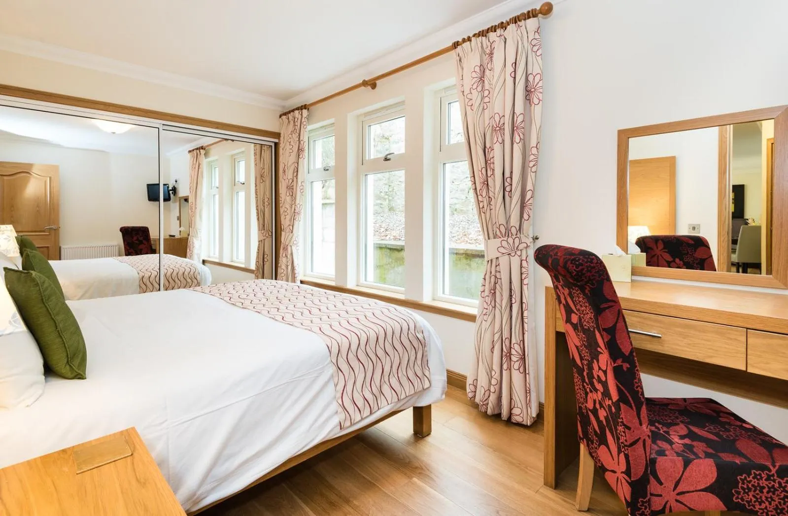 Bed in The Claymore Guest House