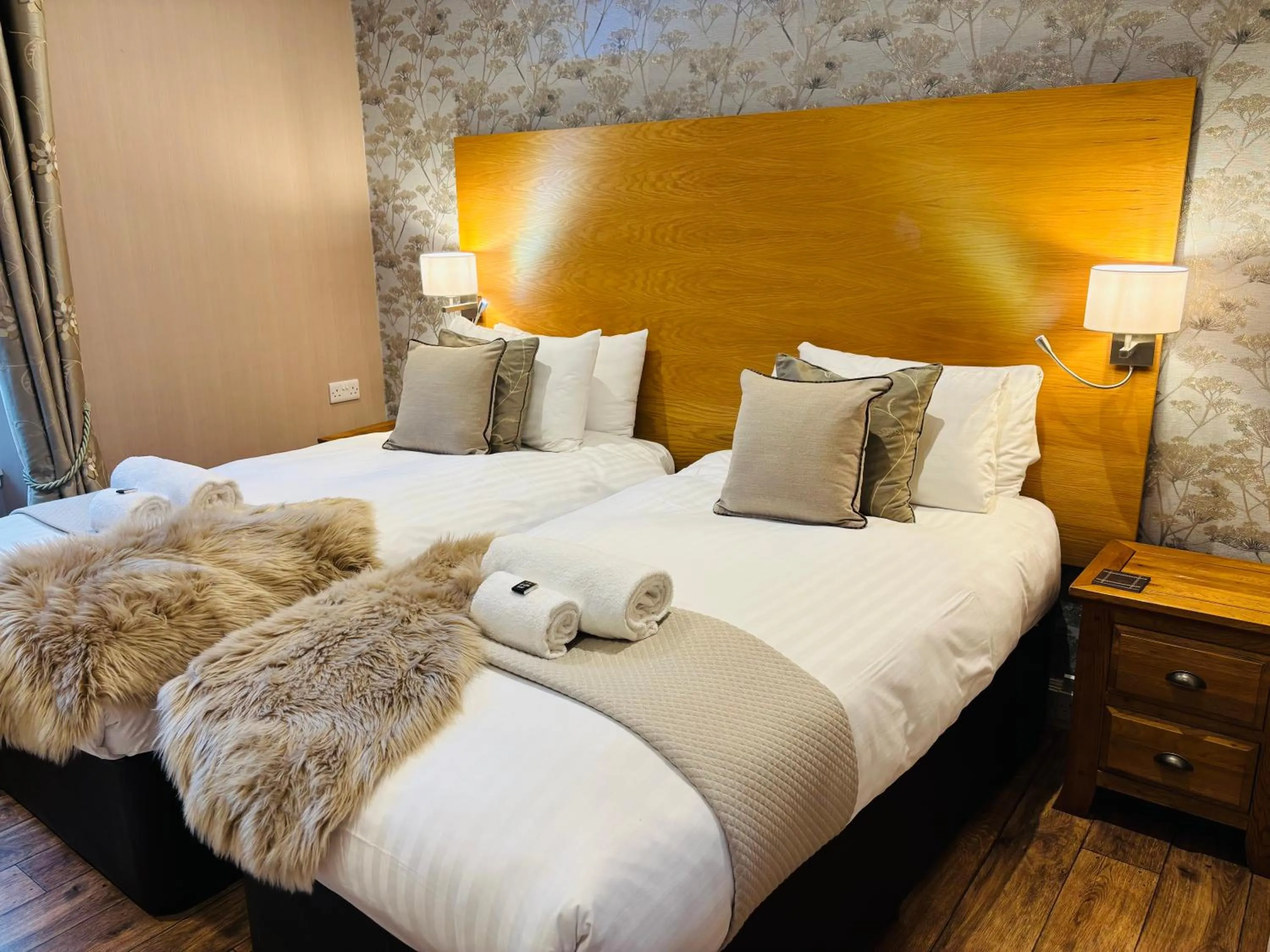 Bed in The Claymore Guest House