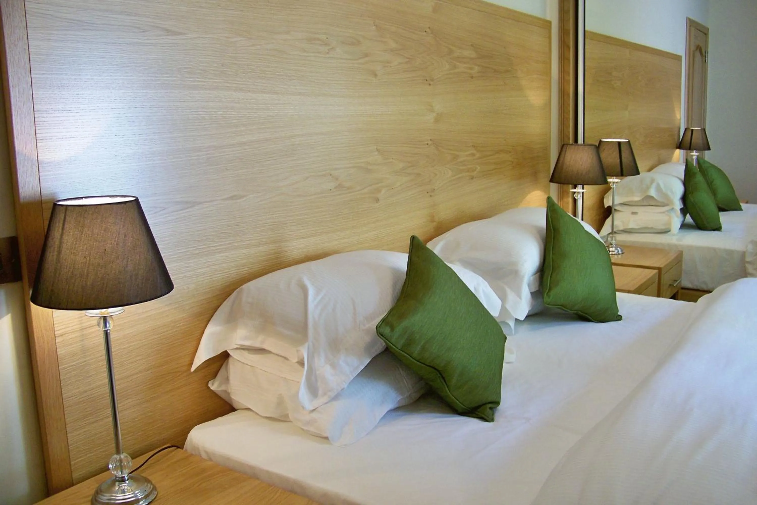 Bed in The Claymore Guest House