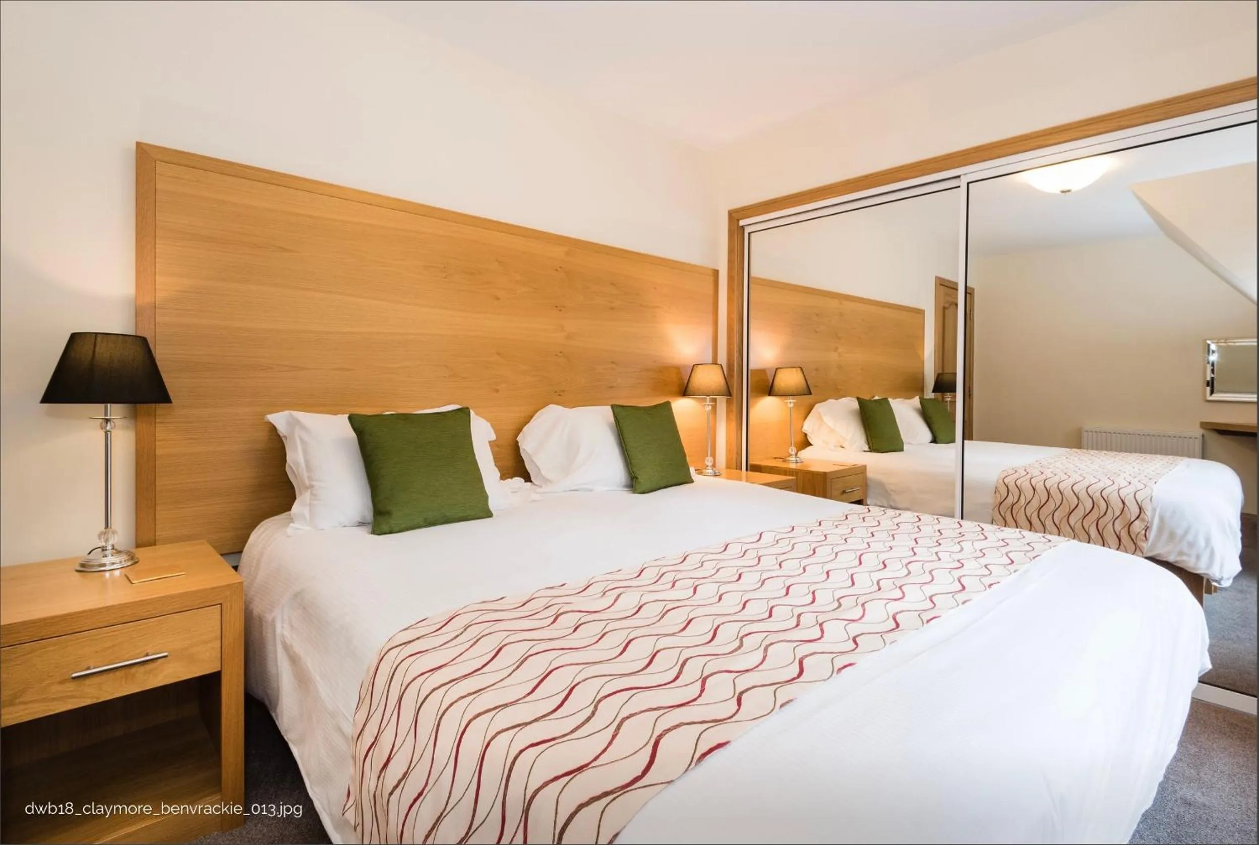 Bed in The Claymore Guest House