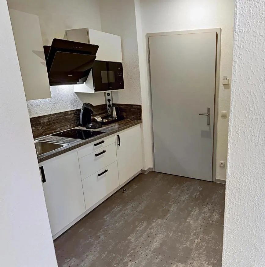 Kitchen or kitchenette in Boardinghouse Emden