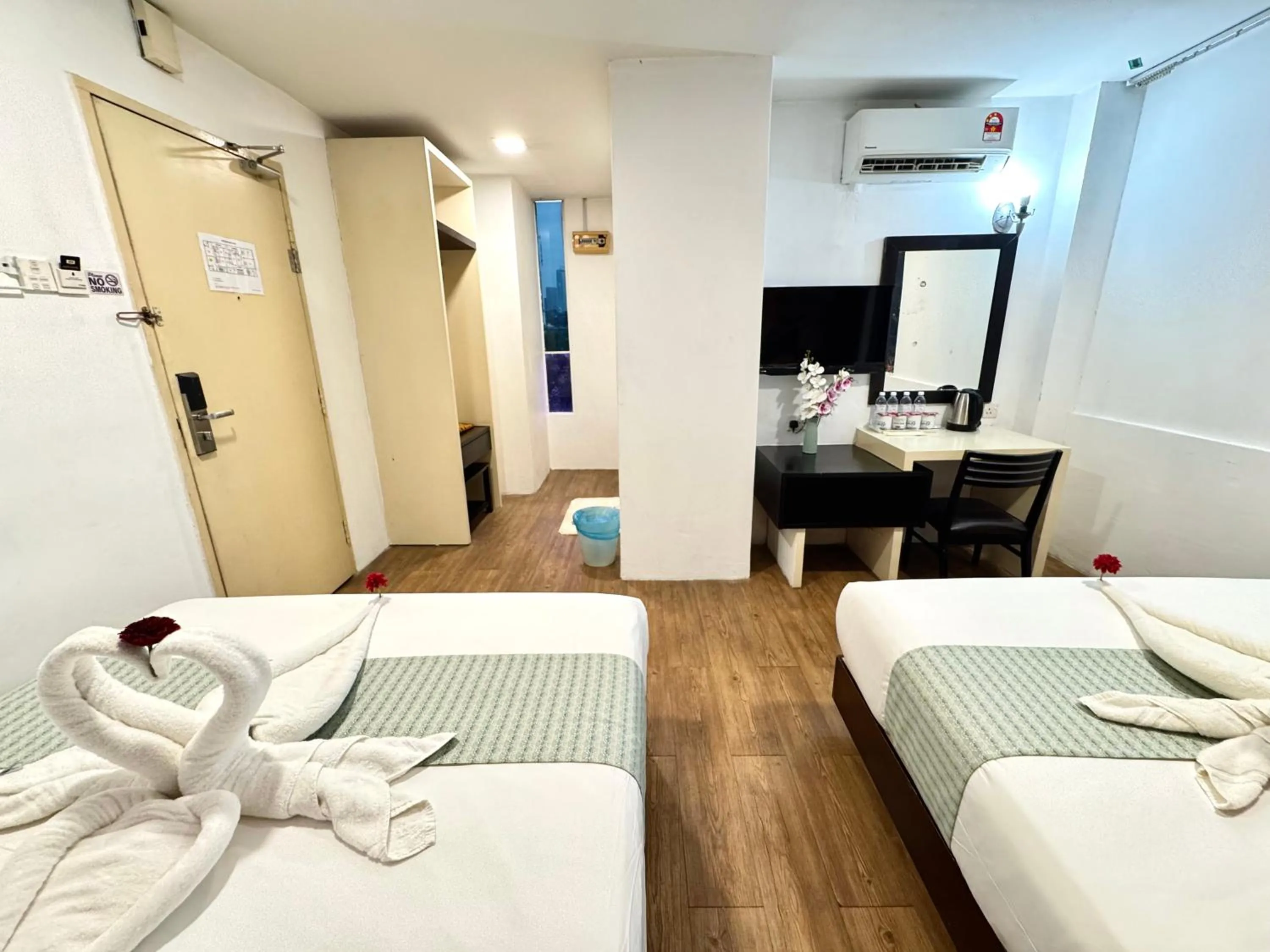 Bed in Swiss Hotel Kuala Lumpur