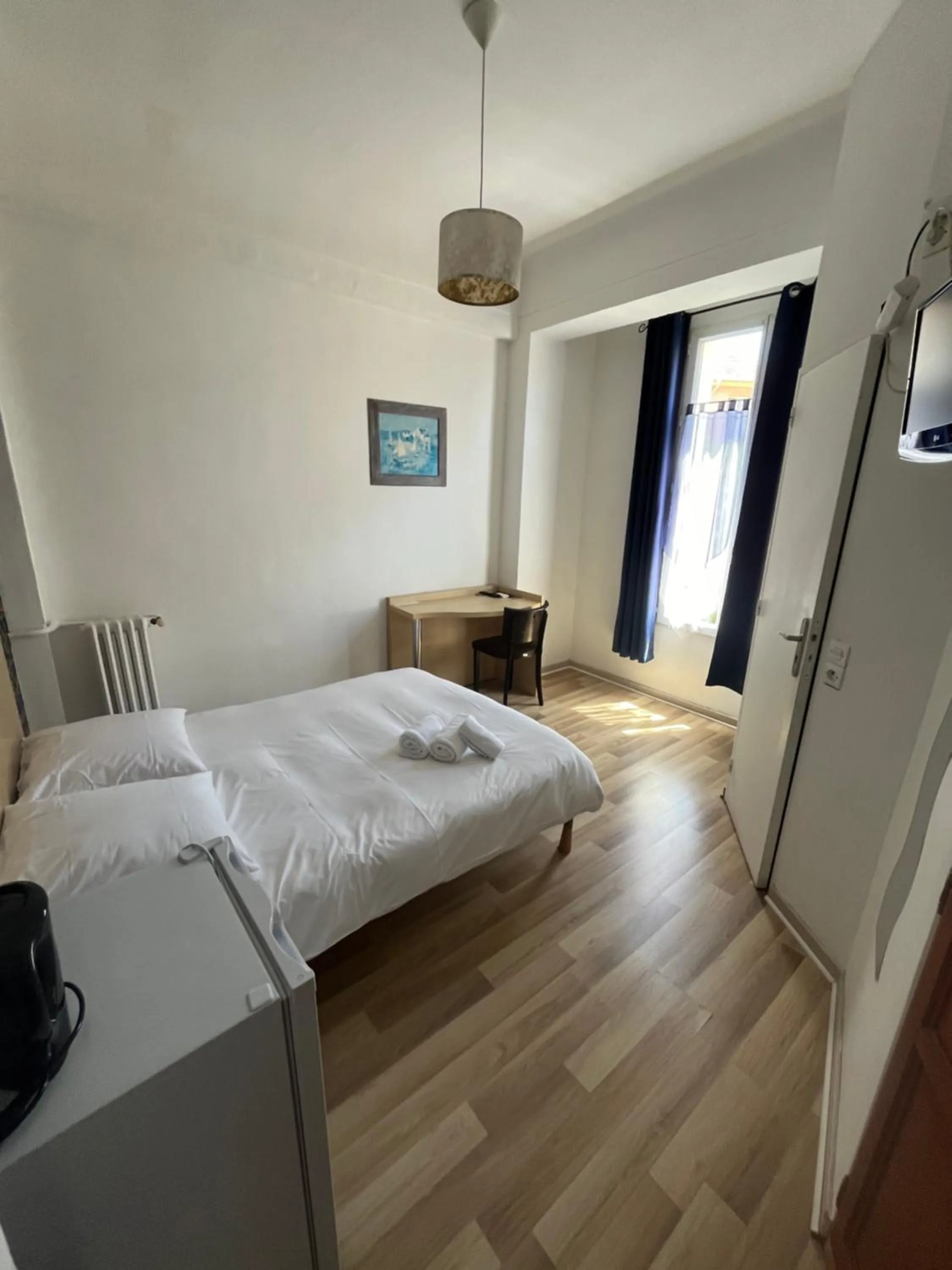 Bedroom in Hôtel Trianon