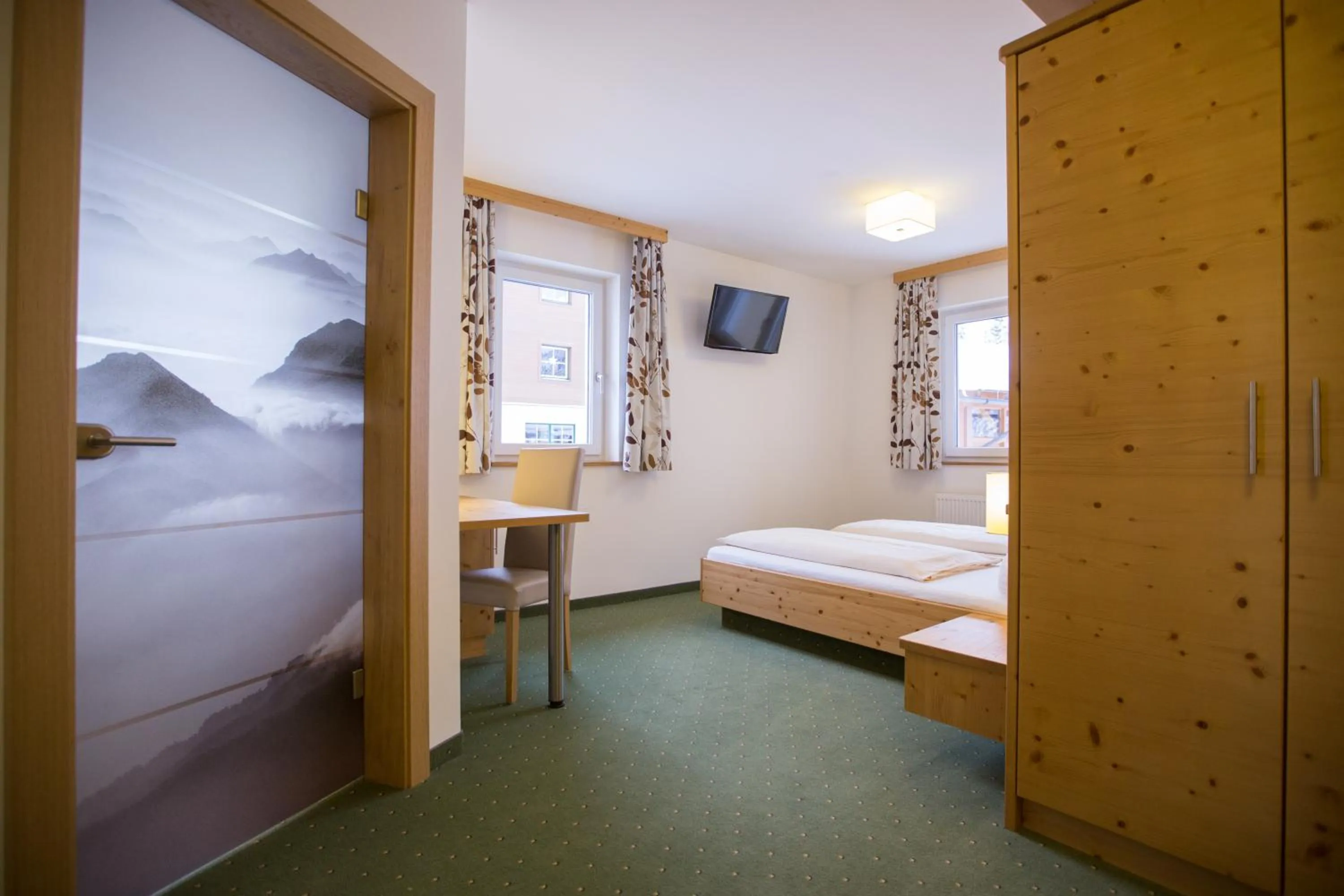 Photo of the whole room, Bed in Hotel Ennskraxblick