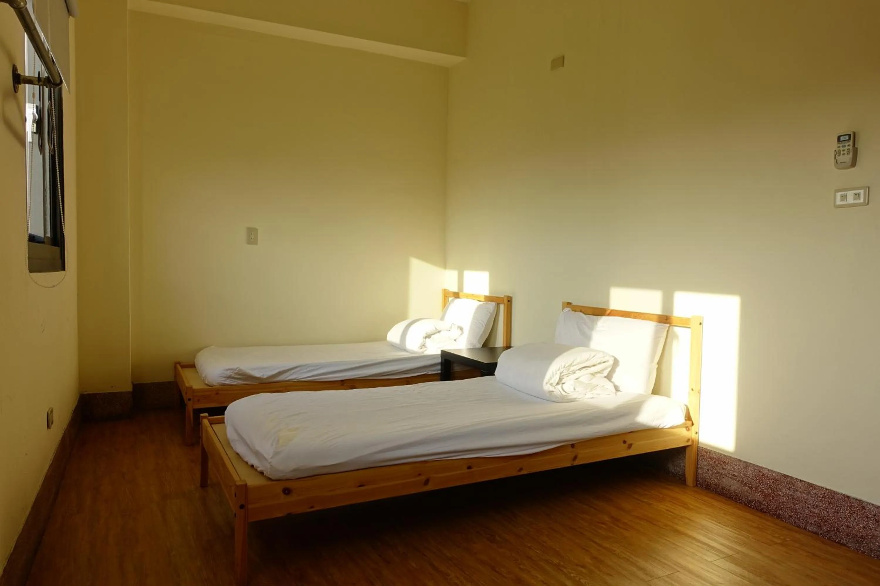 Bed in Chiayi Petite Hostel