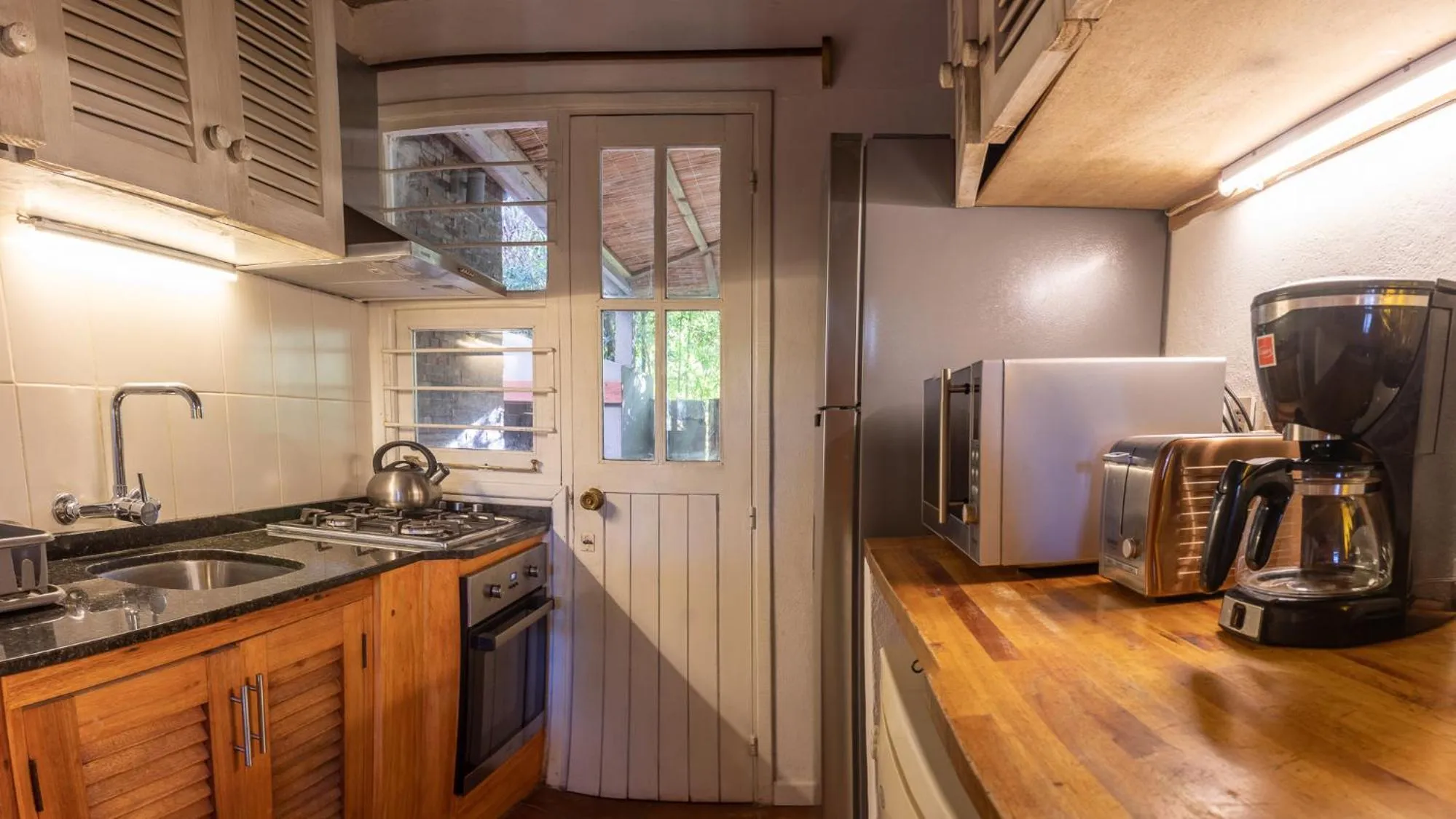 stove in Aloe Village Aparthotel & Spa