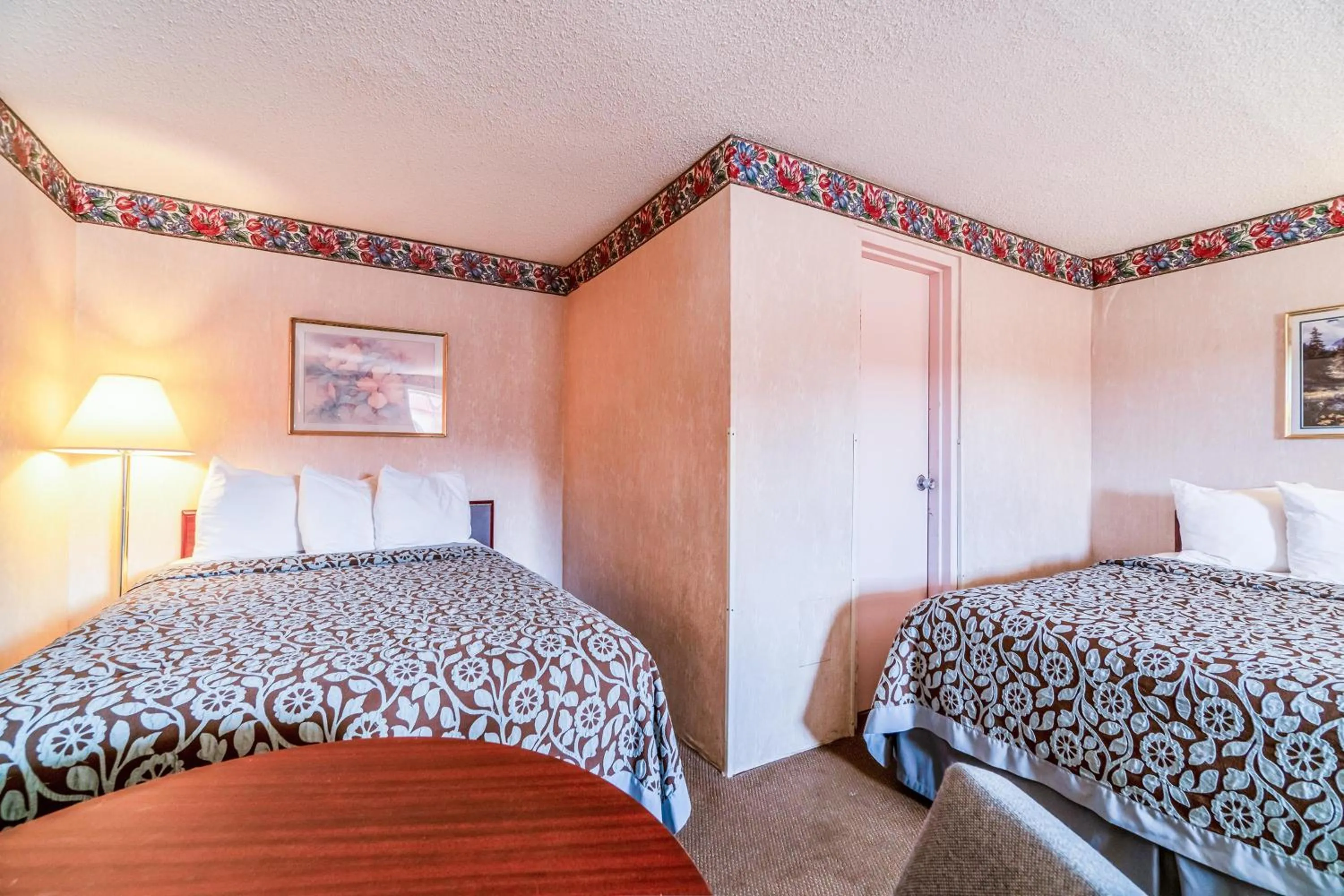 Bedroom, Bed in Ozark Junction mountain view by OYO