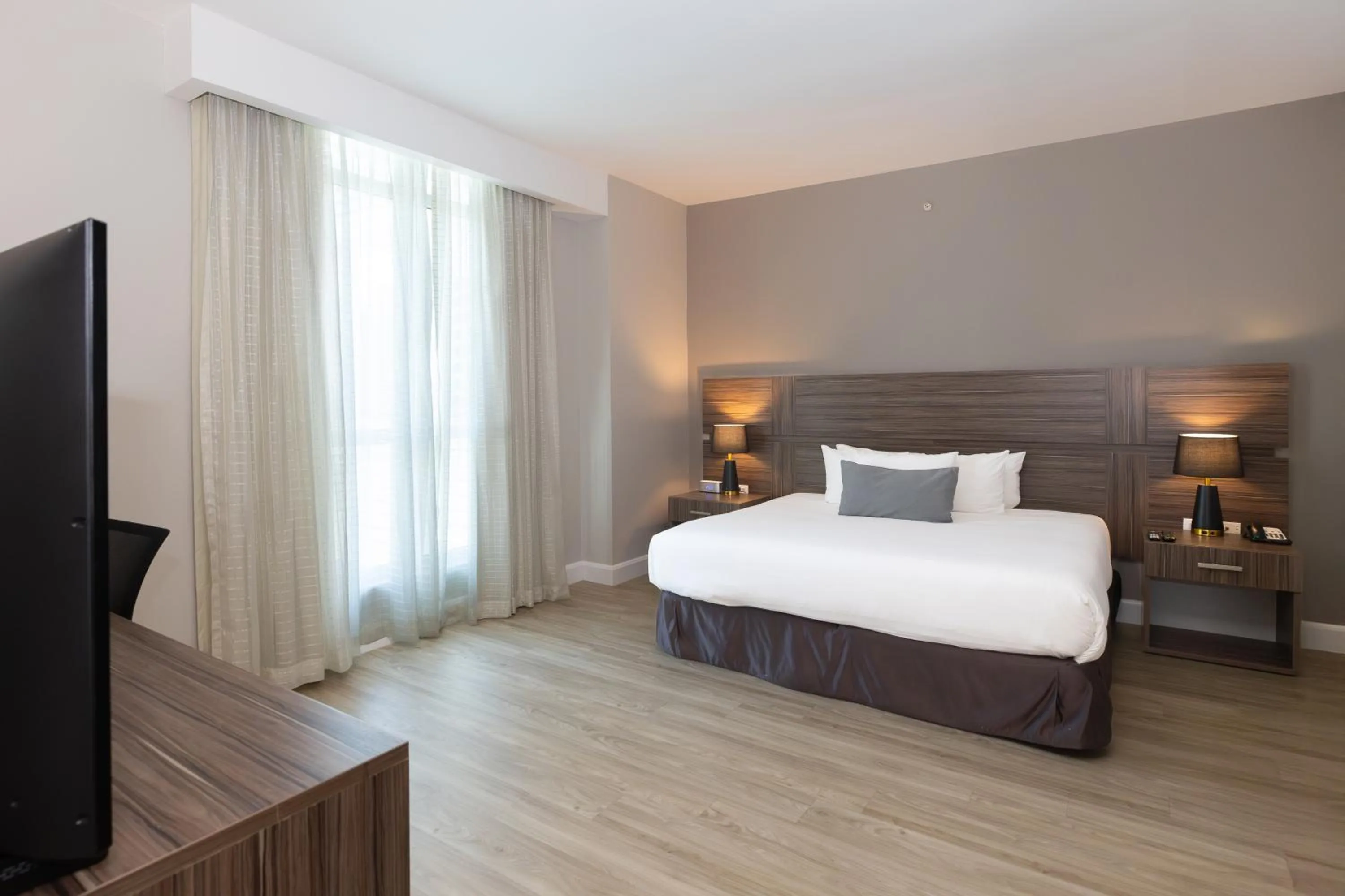 Bed in Victoria Hotel and Suites Panama